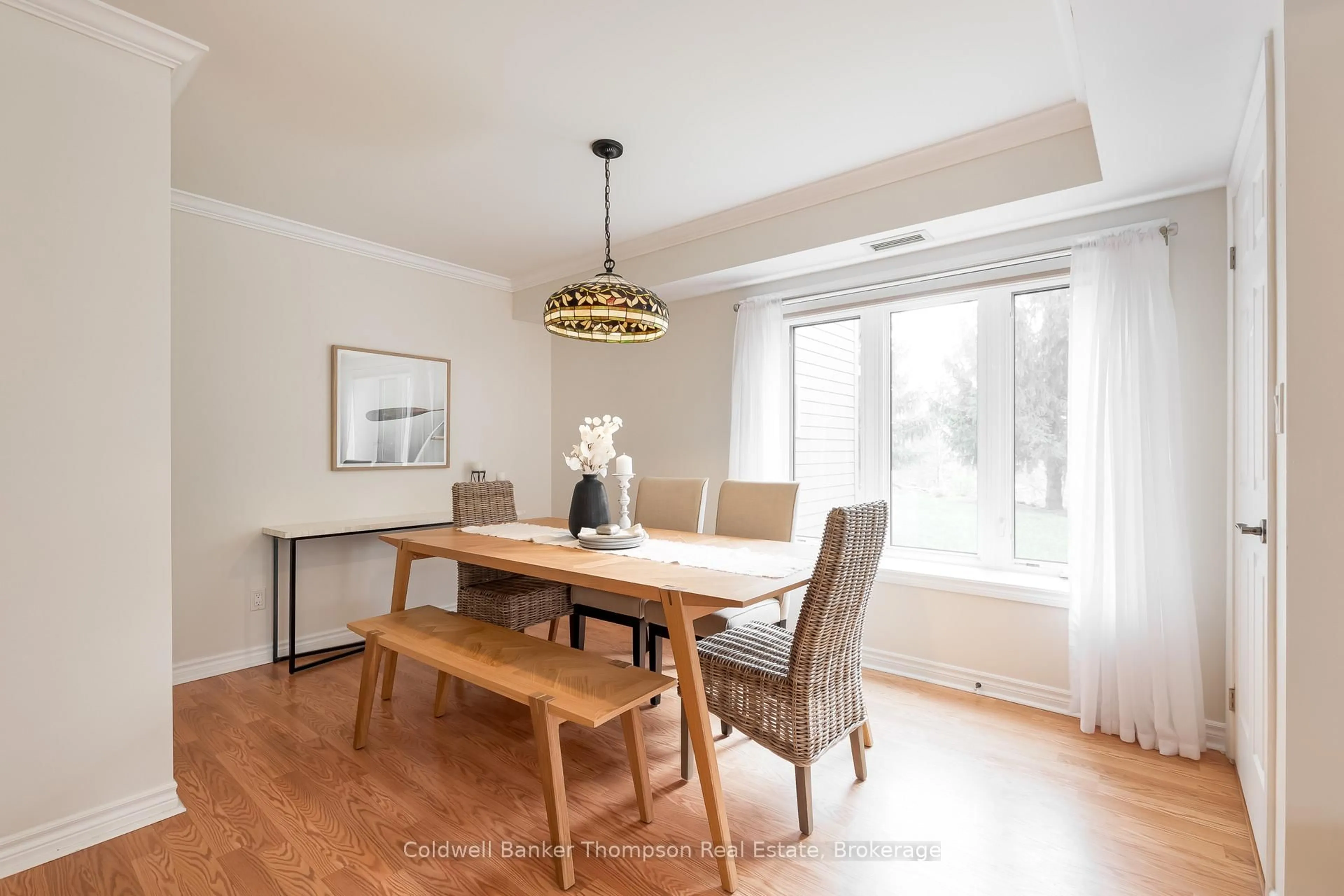 Dining room, wood/laminate floor for 24 Dairy Lane #101, Huntsville Ontario P1H 0A4