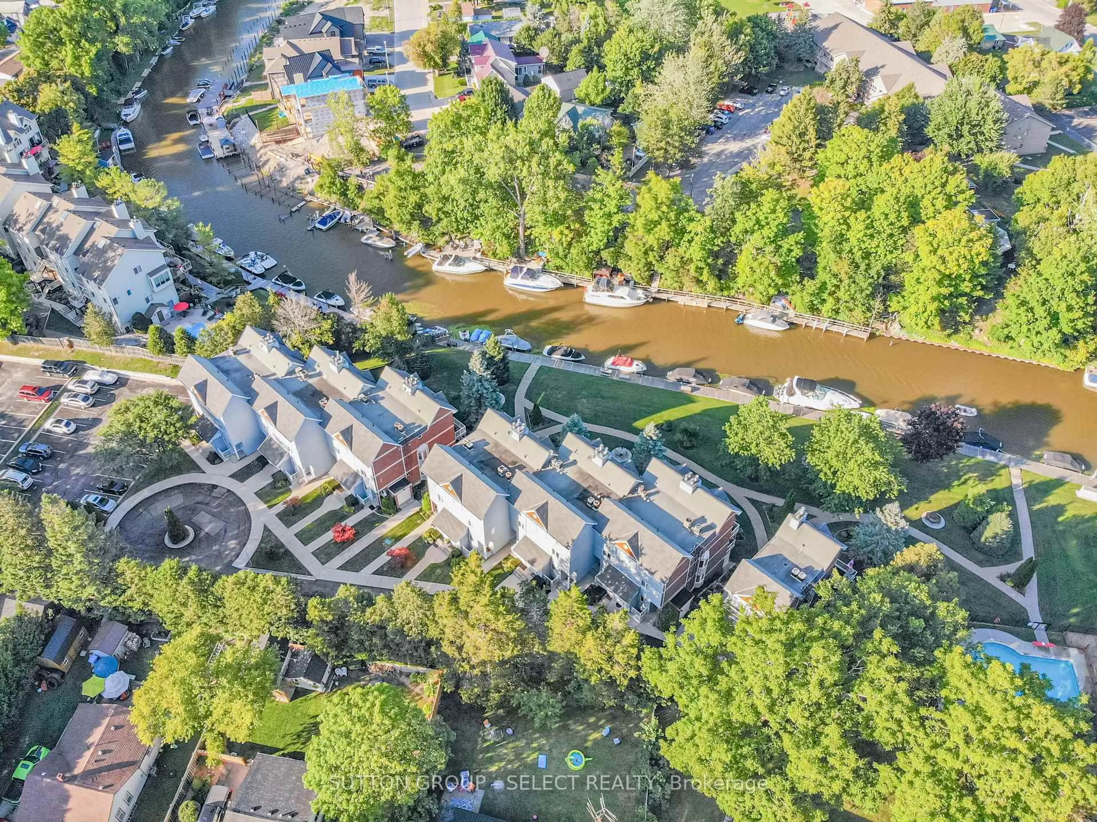 A pic from outside/outdoor area/front of a property/back of a property/a pic from drone, water/lake/river/ocean view for 48 Ontario St #24, Lambton Shores Ontario N0M 1T0