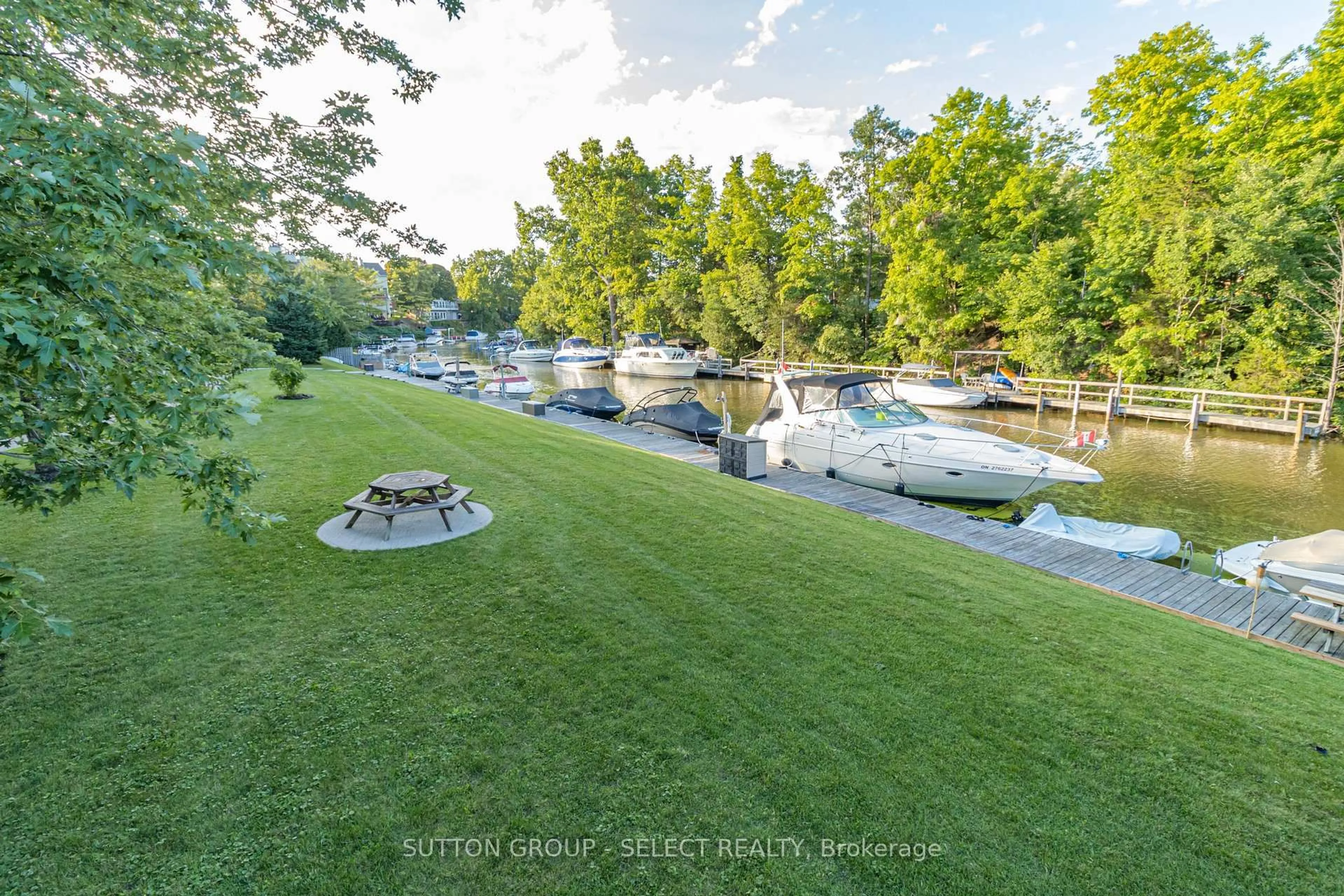 A pic from outside/outdoor area/front of a property/back of a property/a pic from drone, water/lake/river/ocean view for 48 Ontario St #24, Lambton Shores Ontario N0M 1T0