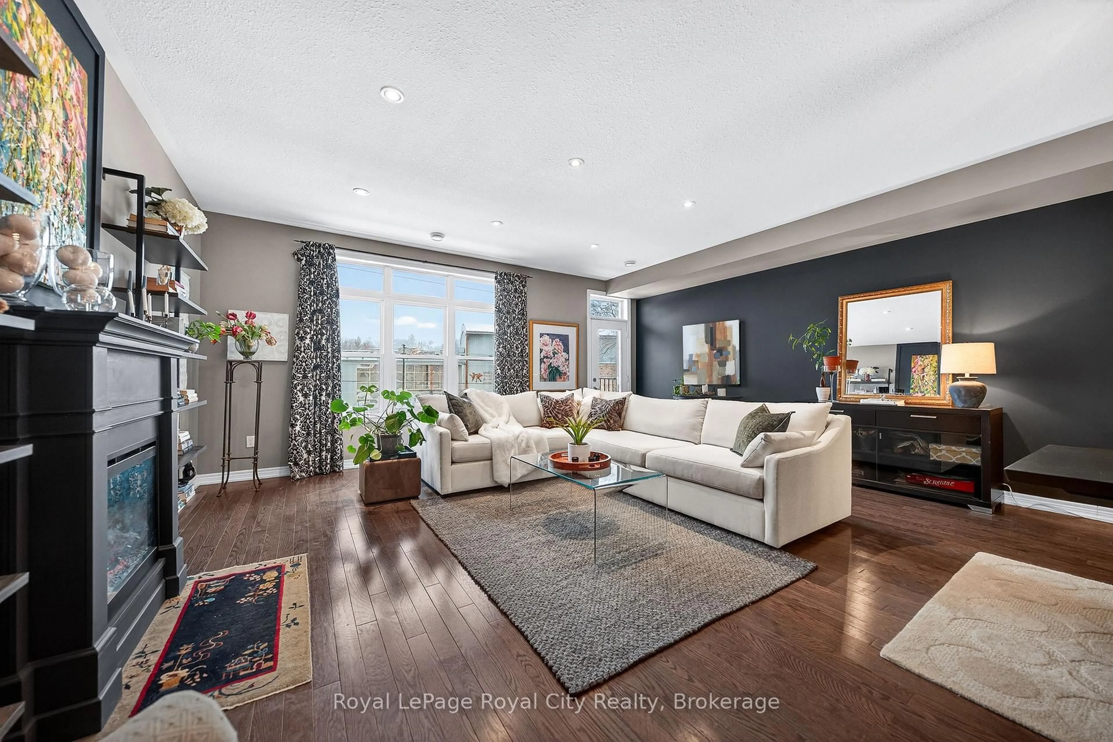 Living room with furniture, wood/laminate floor for 92 Cardigan St, Guelph Ontario N1H 0A4