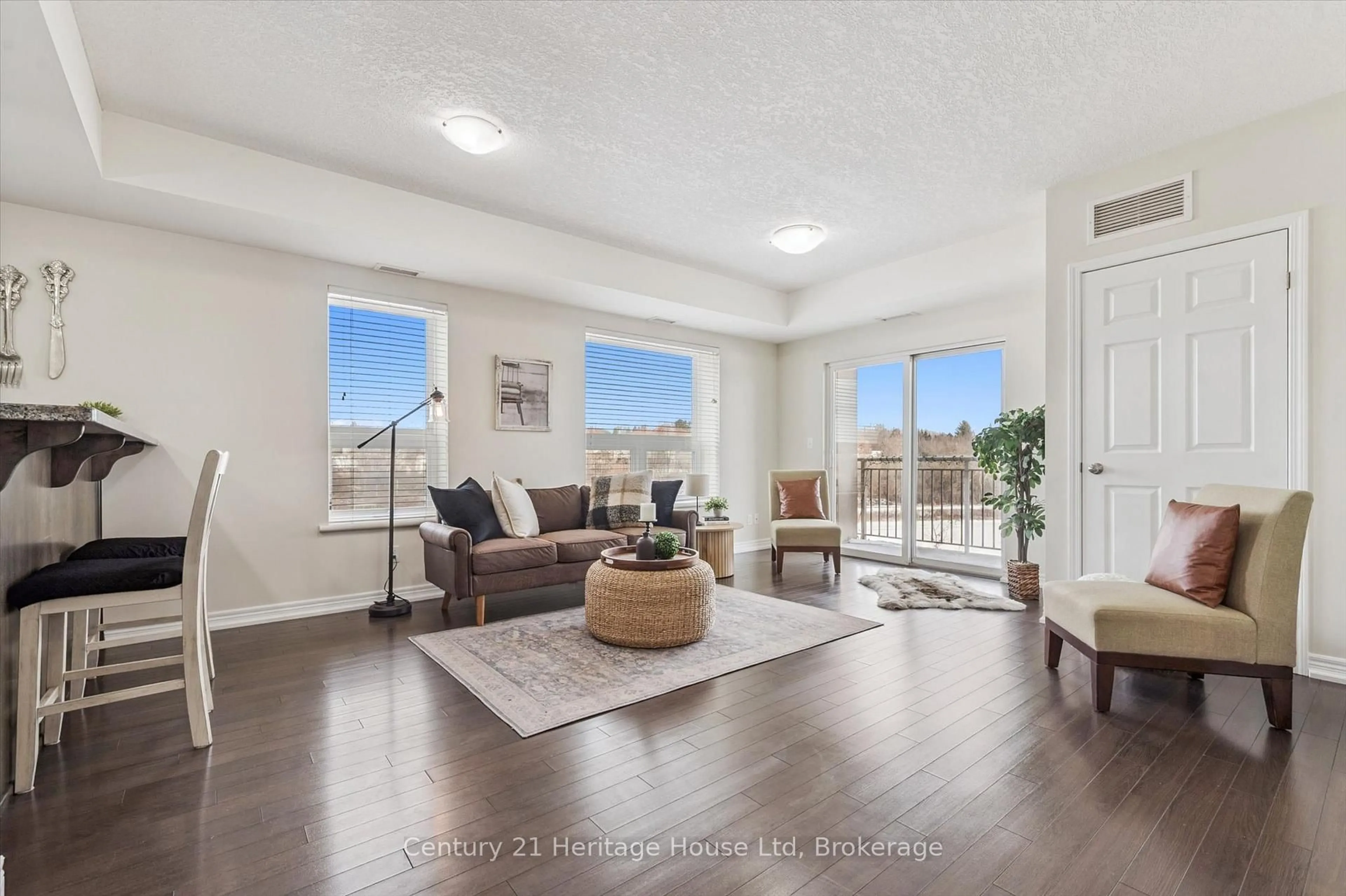 Living room with furniture, unknown for 901 Paisley Rd #402, Guelph Ontario N1K 0A7