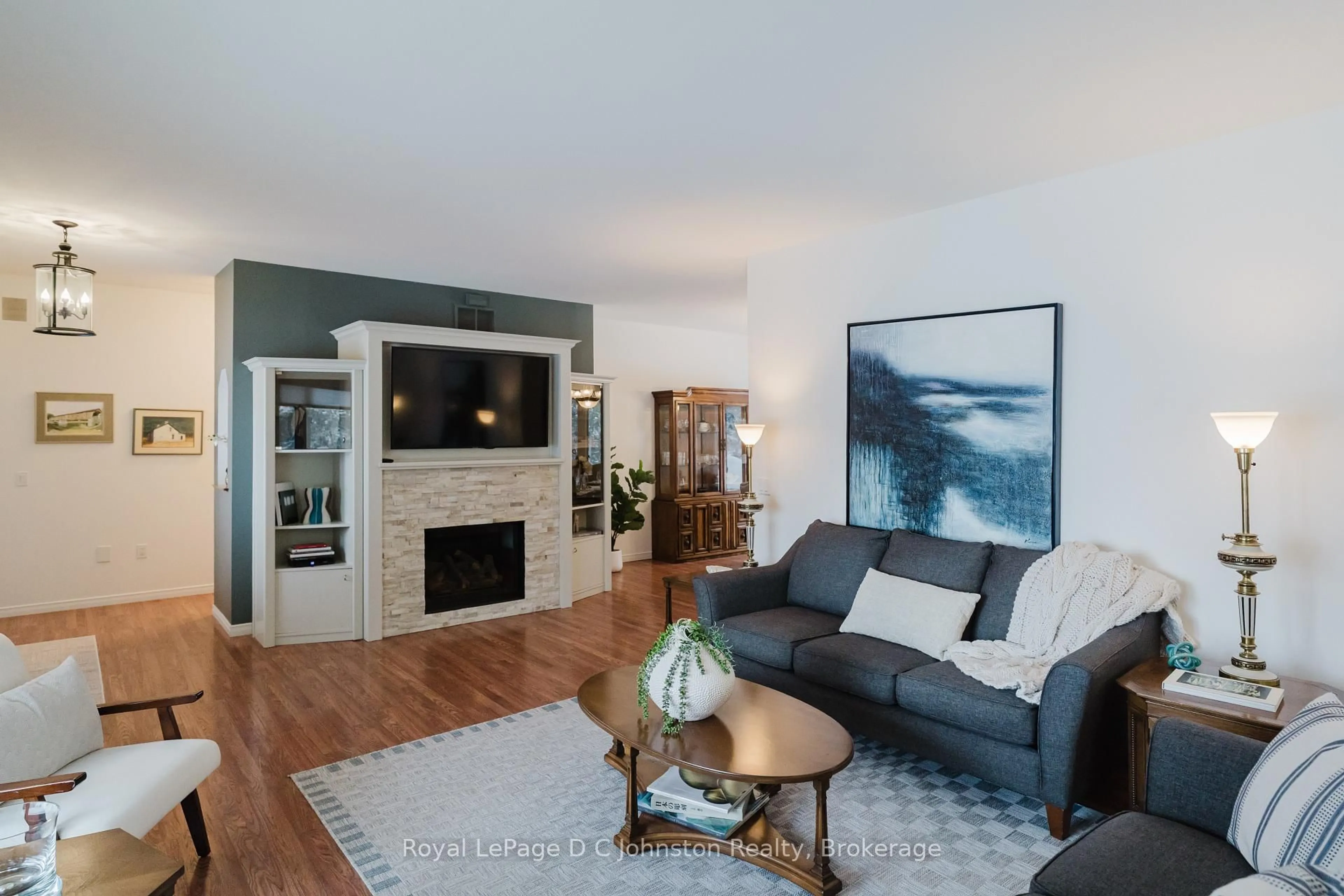 Living room with furniture, wood/laminate floor for 60 Miramichi Bay Rd, Saugeen Shores Ontario N0H 2C6