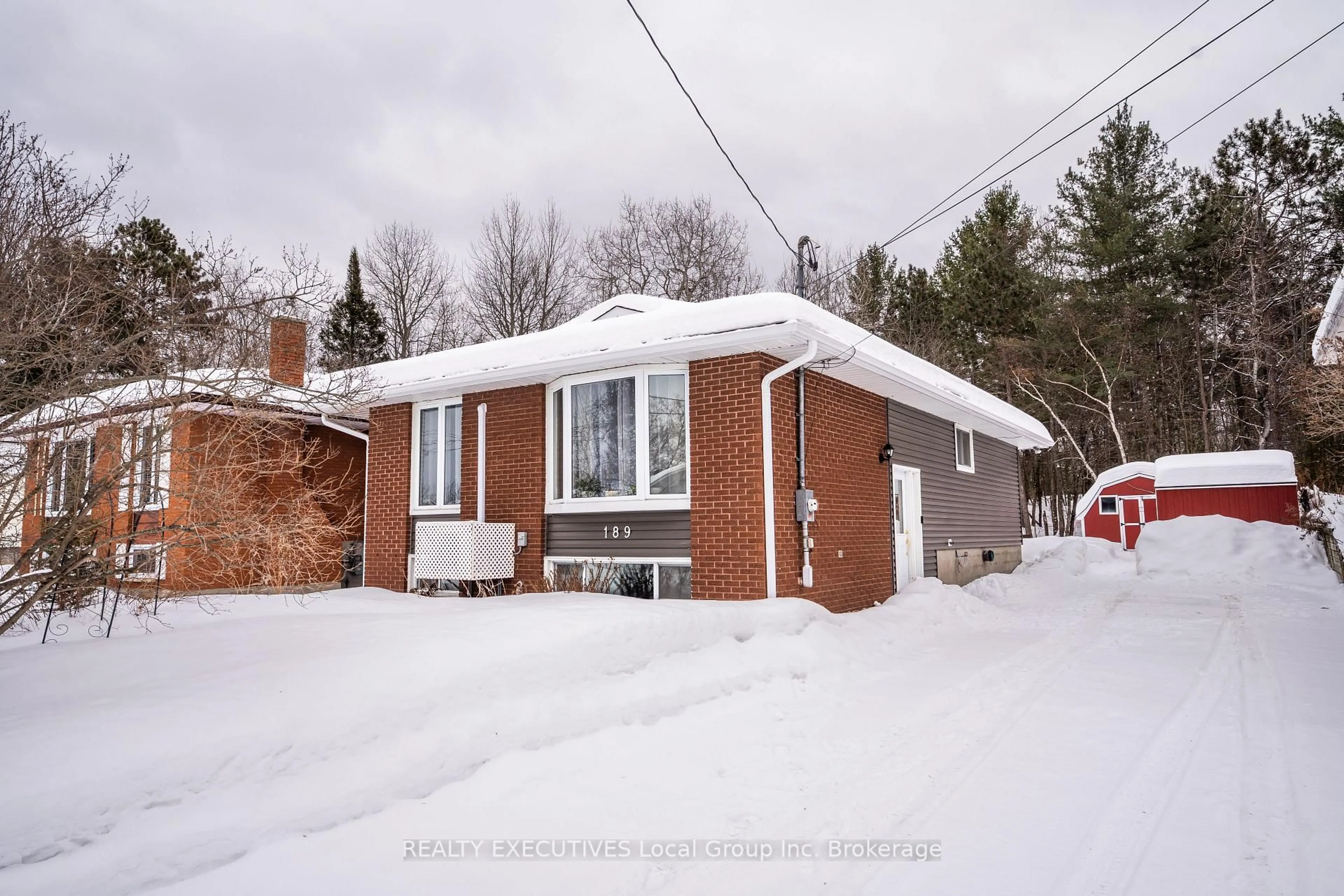 Home with brick exterior material, street for 189 View St, Callander Ontario P0H 1H0