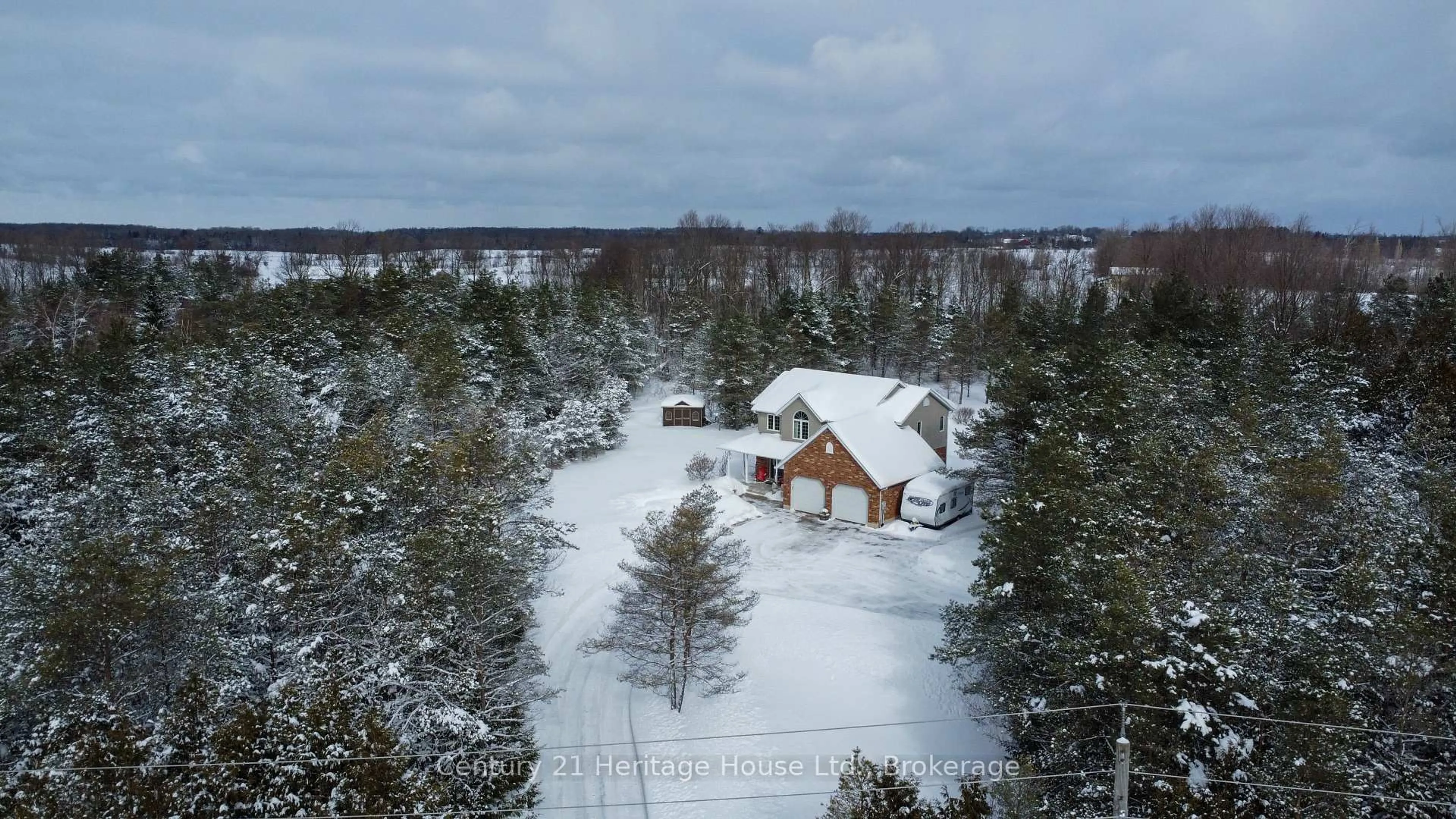 A pic from outside/outdoor area/front of a property/back of a property/a pic from drone, forest/trees view for 323237 Durham Rd, West Grey Ontario N0G 1R0