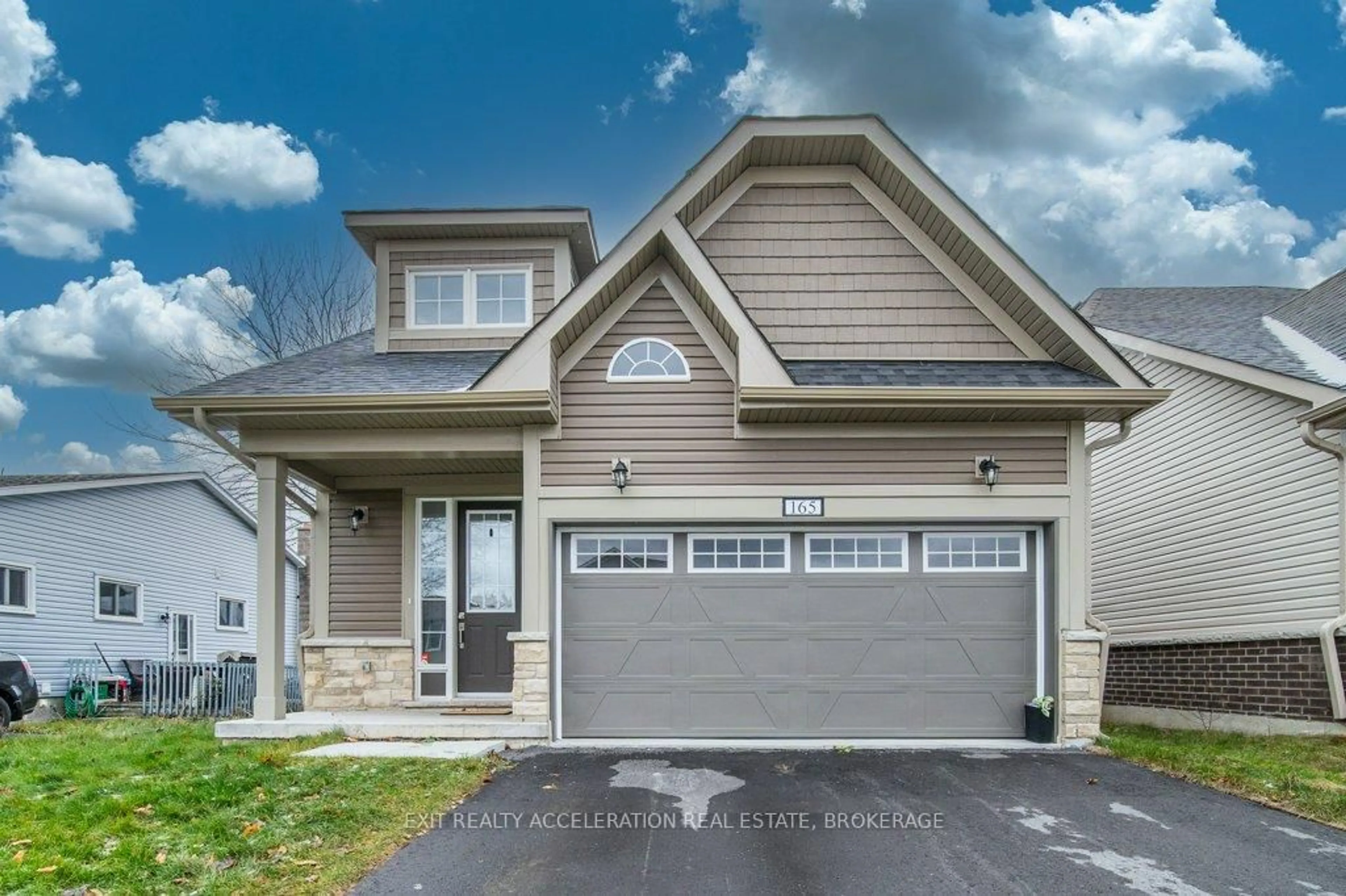 Home with vinyl exterior material, street for 165 Purdy Rd, Bath Ontario K0H 1G0