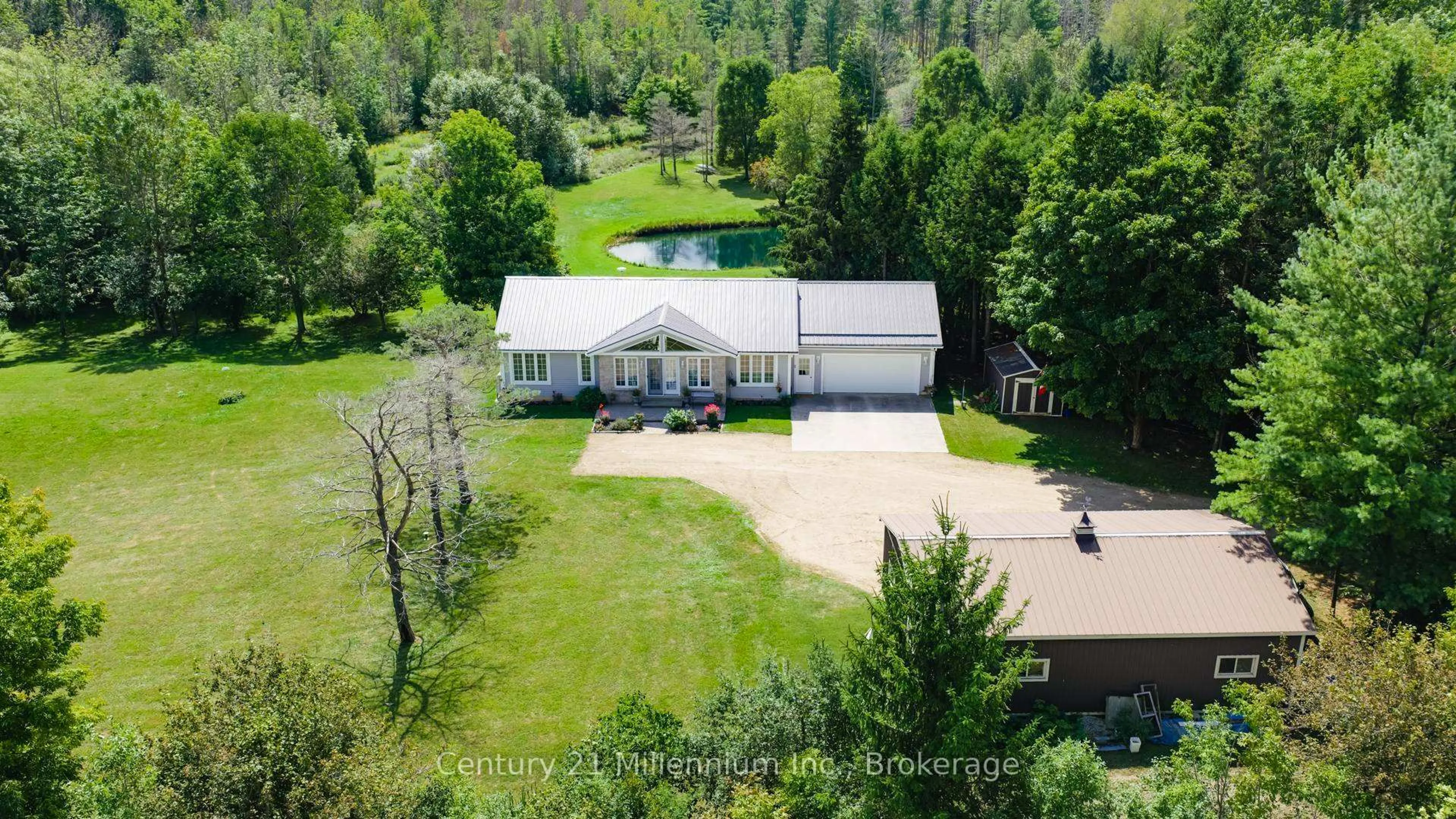 A pic from outside/outdoor area/front of a property/back of a property/a pic from drone, unknown for 9849 Wellington Rd 3, Minto Ontario N0G 1M0