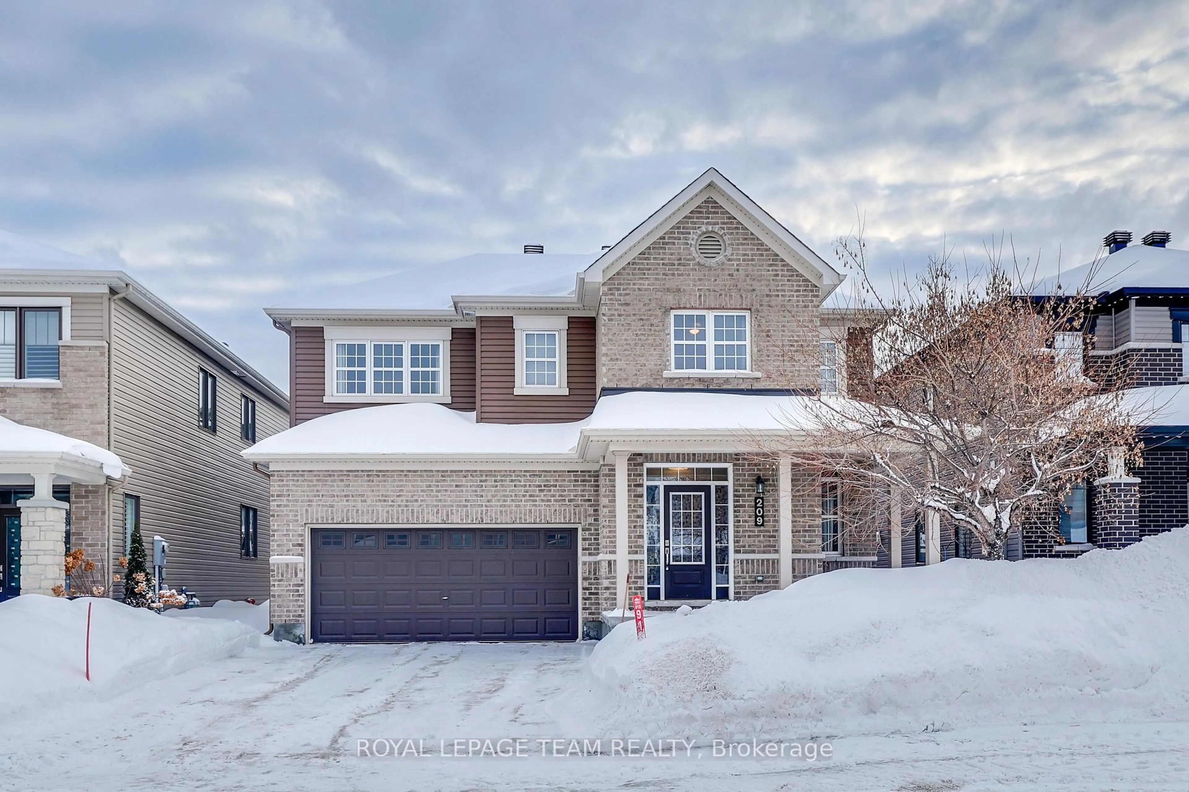 Home with brick exterior material, street for 209 Mission Trail Cres, Ottawa Ontario K2T 0H7