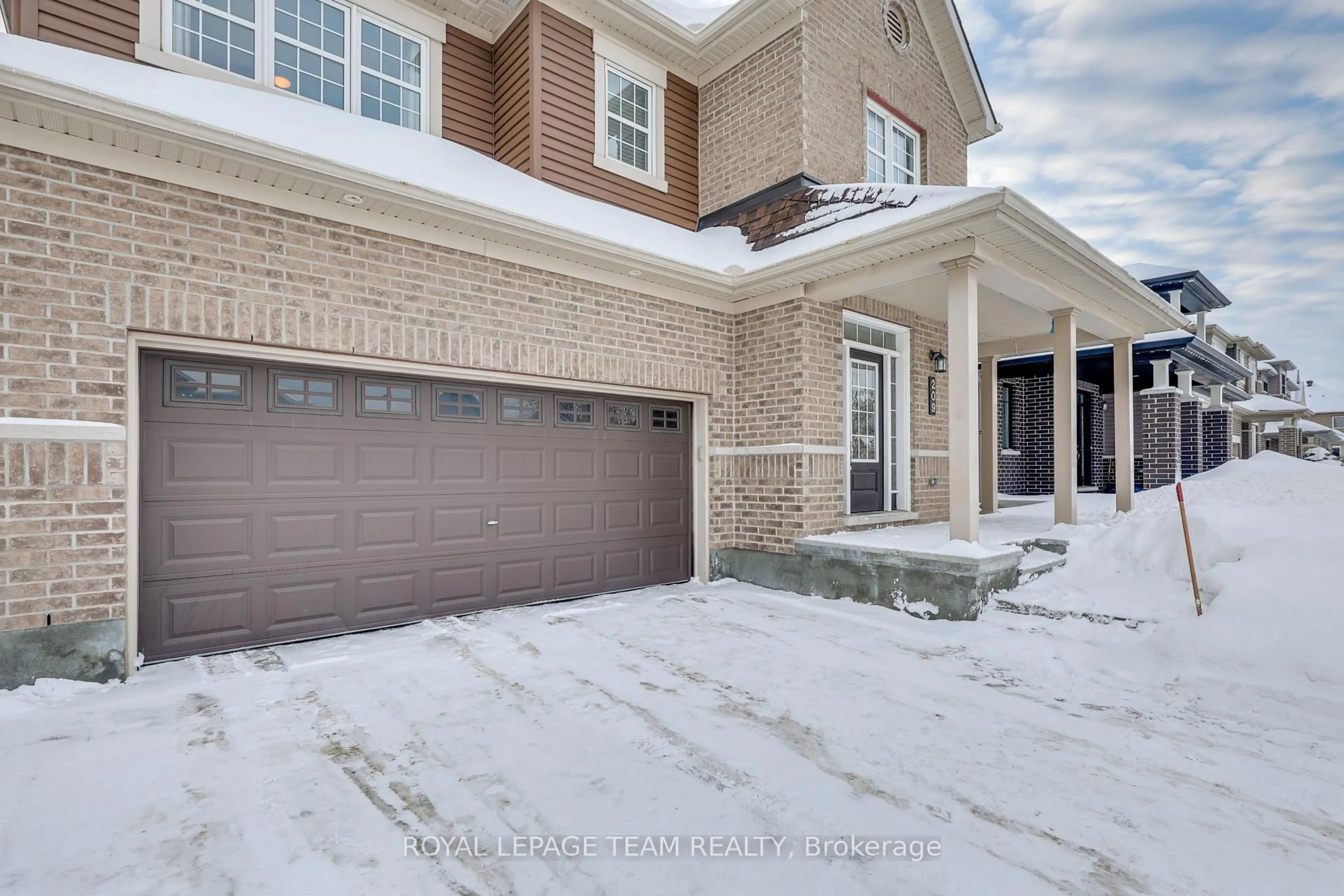 Home with brick exterior material, street for 209 Mission Trail Cres, Ottawa Ontario K2T 0H7