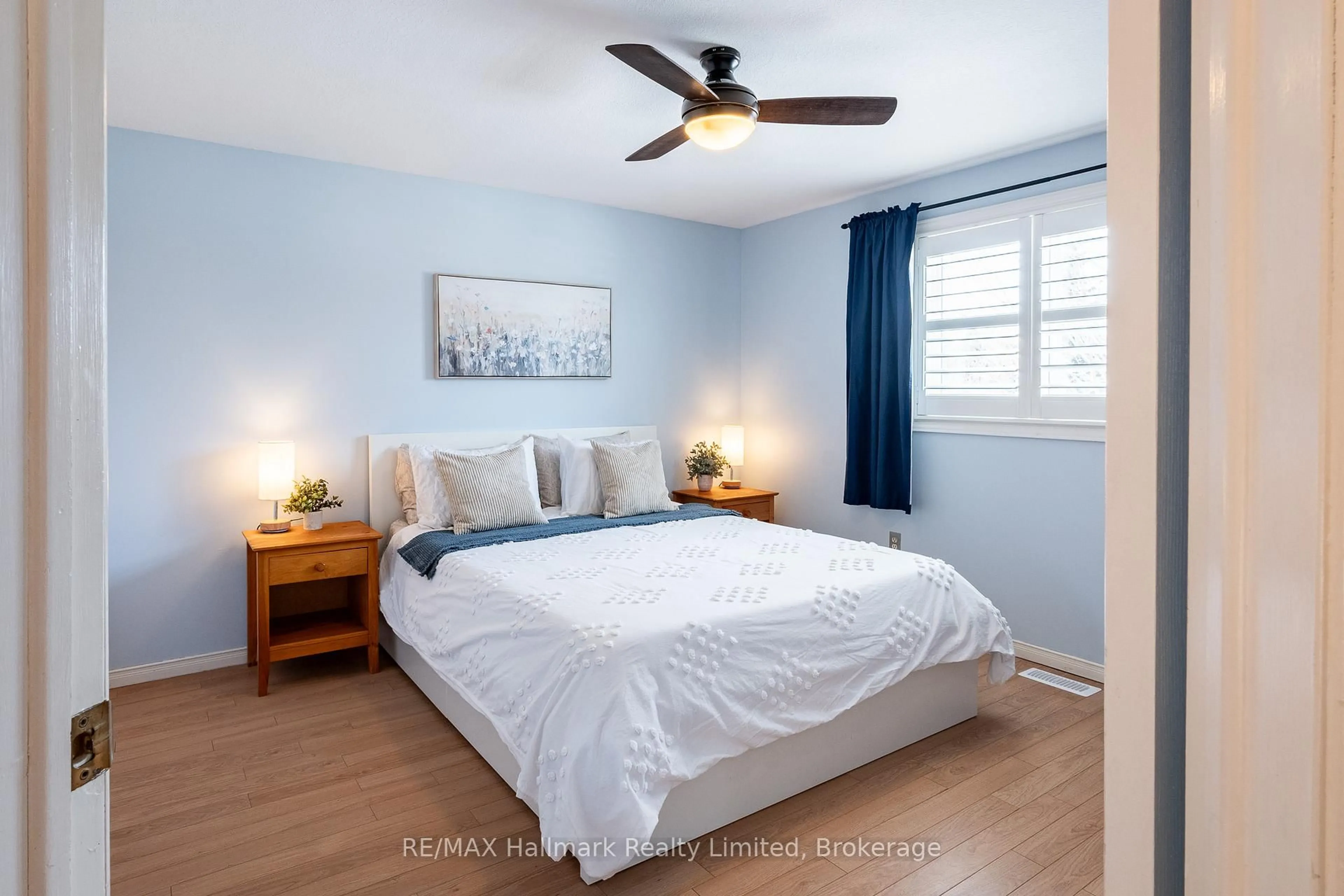 Bedroom with bed, wood/laminate floor for 53 Hewitt Lane, Guelph Ontario N1K 1W1