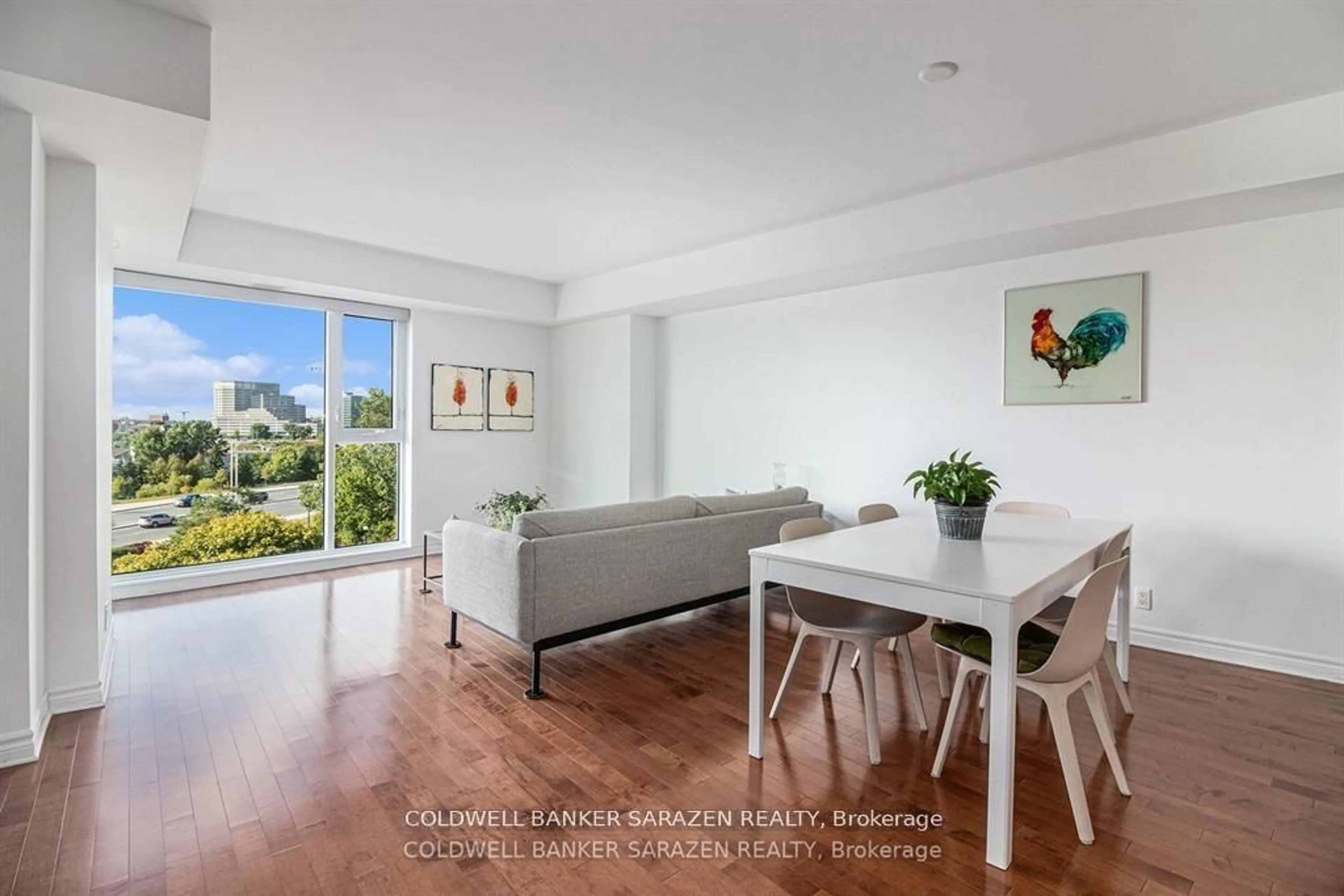 Living room with furniture, wood/laminate floor for 200 Lett St #509, Ottawa Ontario K1R 0A7