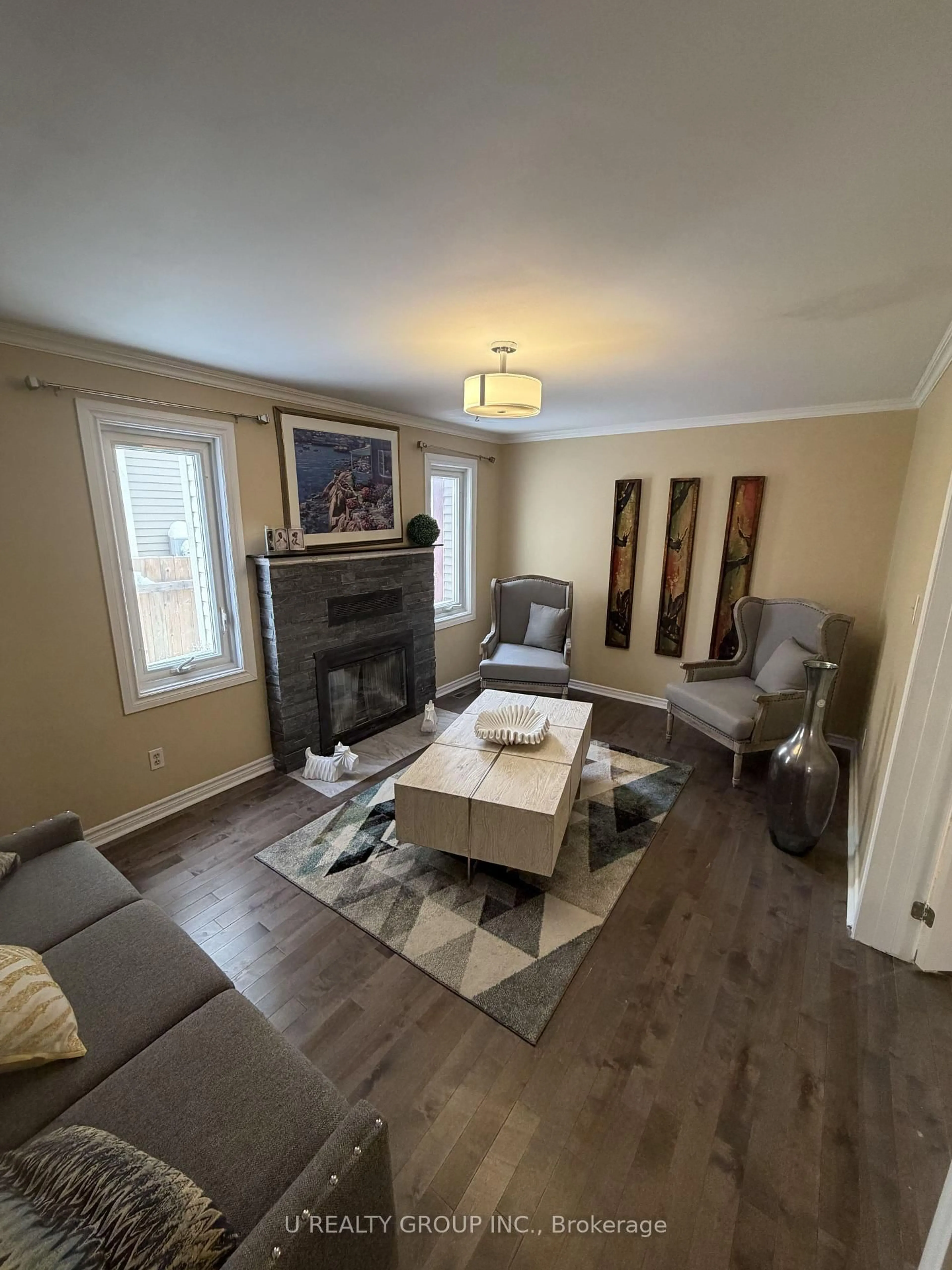 Living room with furniture, wood/laminate floor for 365 Lefebvre Way, Orleans Ontario K1E 2W5