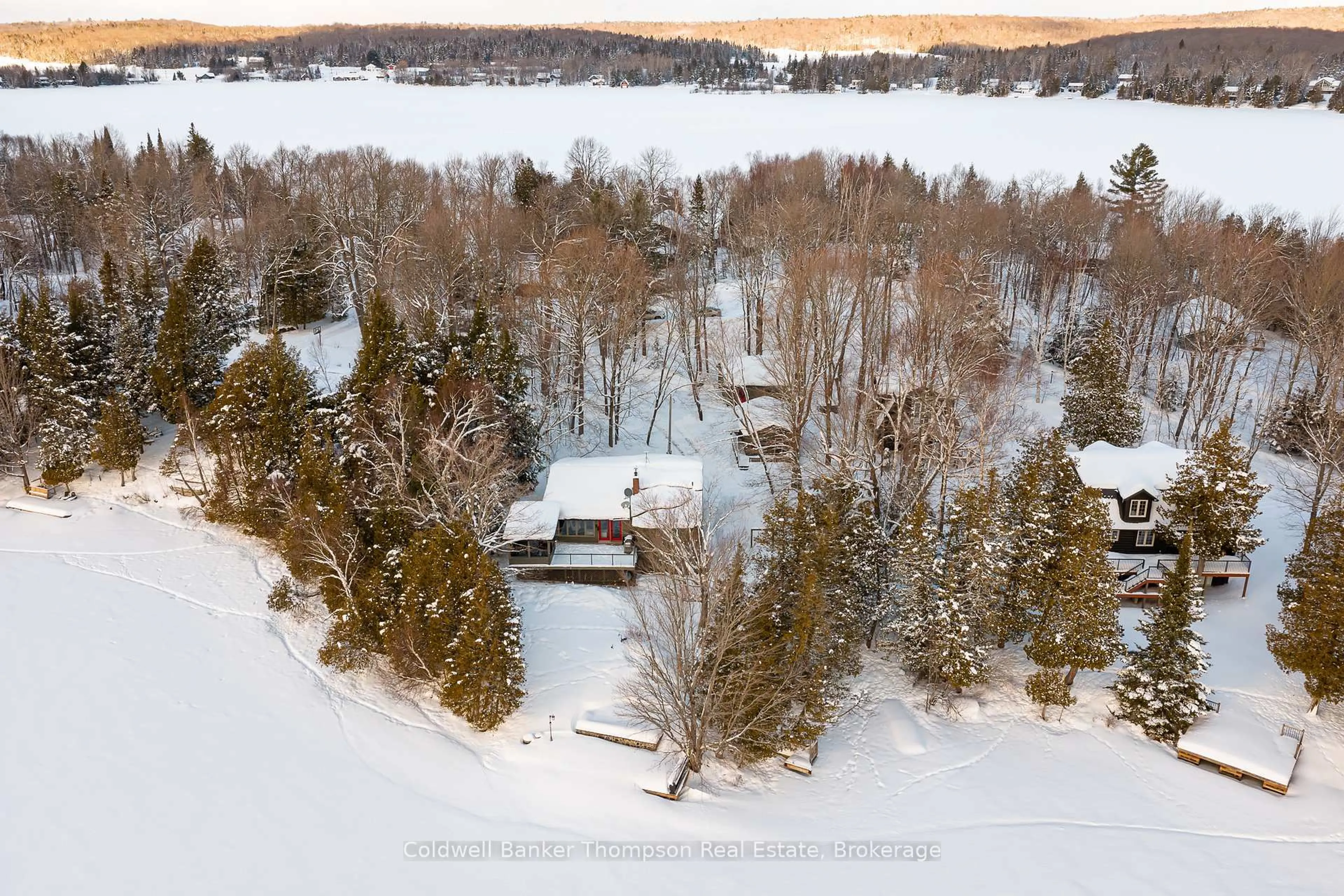 A pic from outside/outdoor area/front of a property/back of a property/a pic from drone, water/lake/river/ocean view for 286 Holden Rd, Magnetawan Ontario P0A 1C0