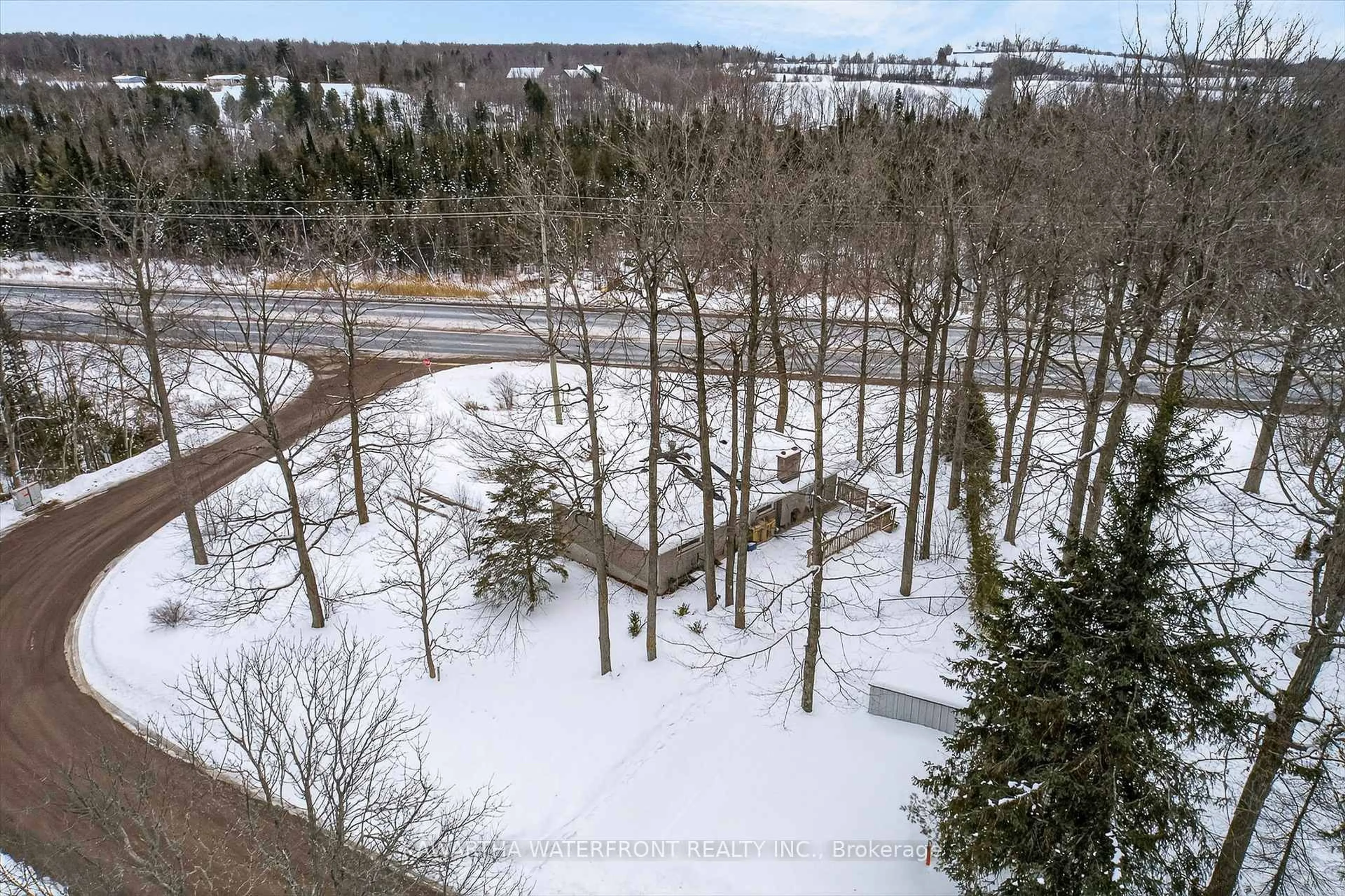 A pic from outside/outdoor area/front of a property/back of a property/a pic from drone, forest/trees view for 12 Leanne Ave, Otonabee-South Monaghan Ontario K9J 6X8