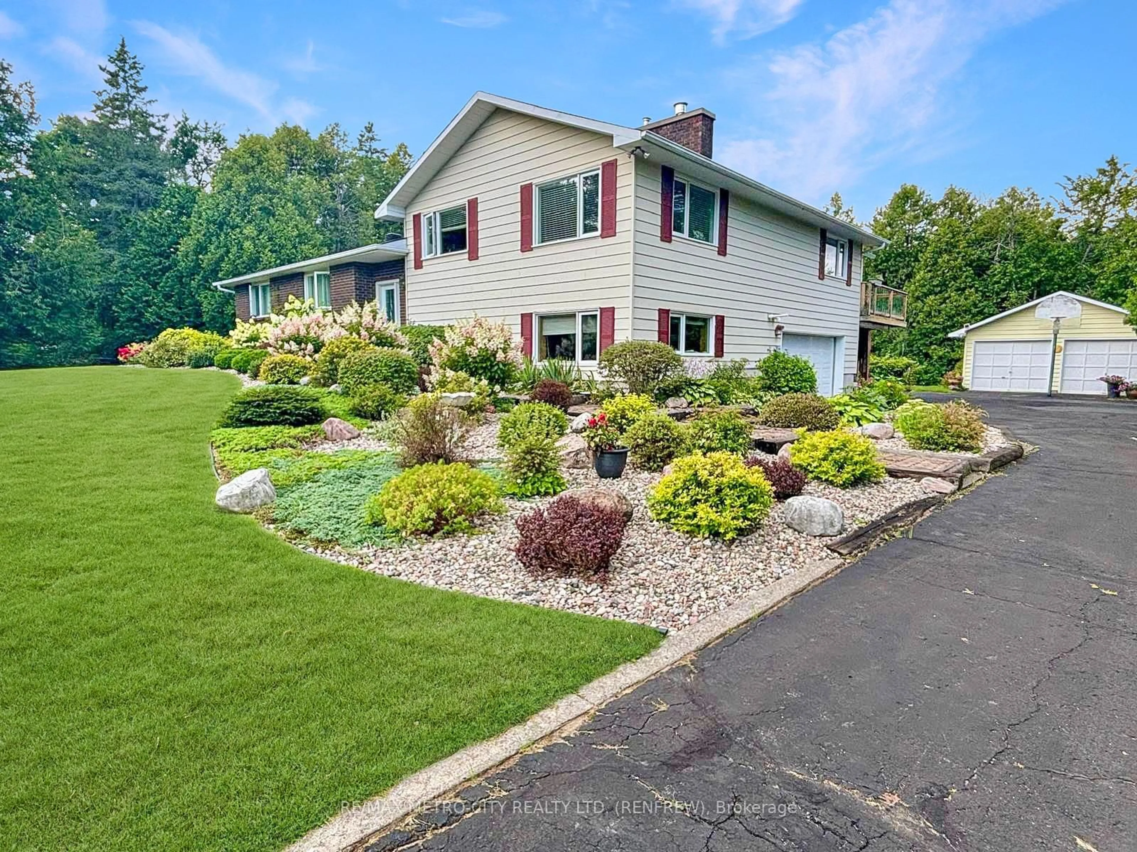 Home with vinyl exterior material, street for 128 Burns Dr, Braeside Ontario K0A 1G0