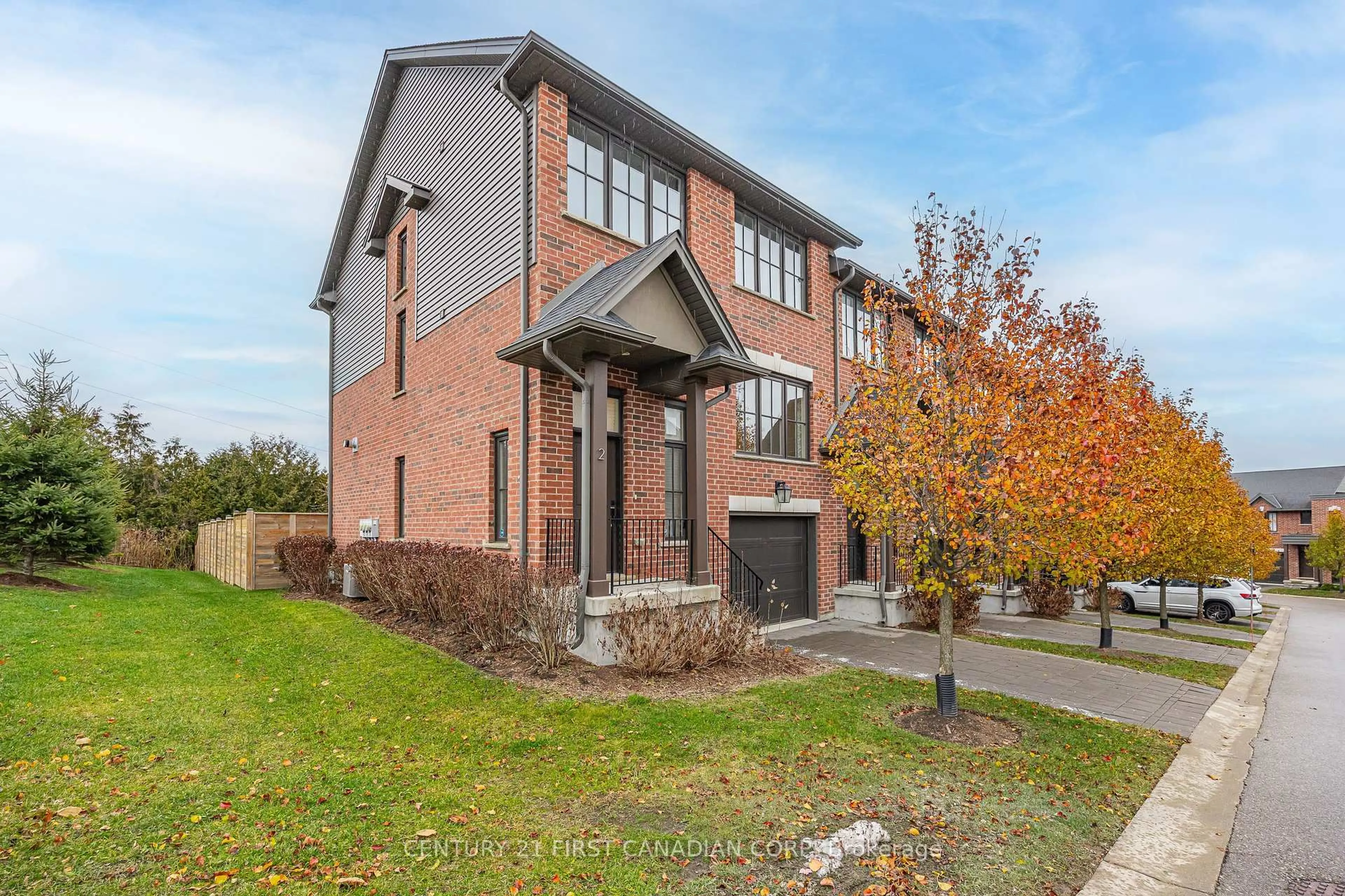 Home with brick exterior material, street for 555 Sunningdale Rd #2, London North Ontario N5X 4B3