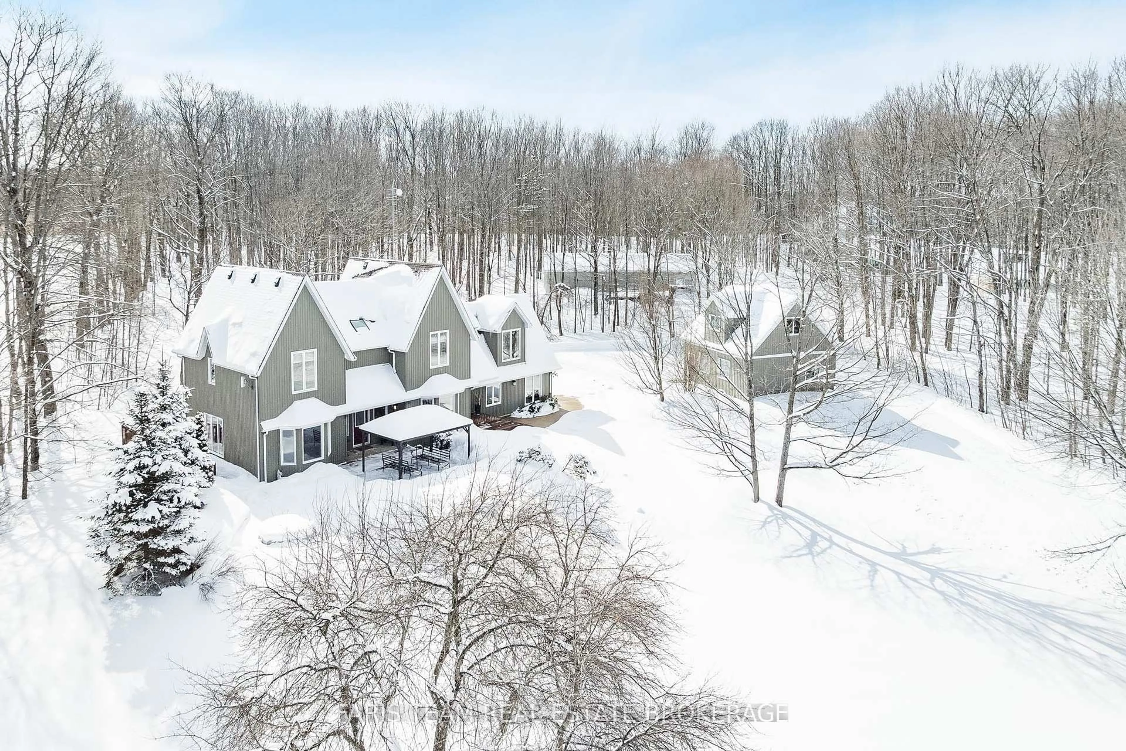 A pic from outside/outdoor area/front of a property/back of a property/a pic from drone, unknown for 714329 Baseline Rd, Grey Highlands Ontario N0C 1E0