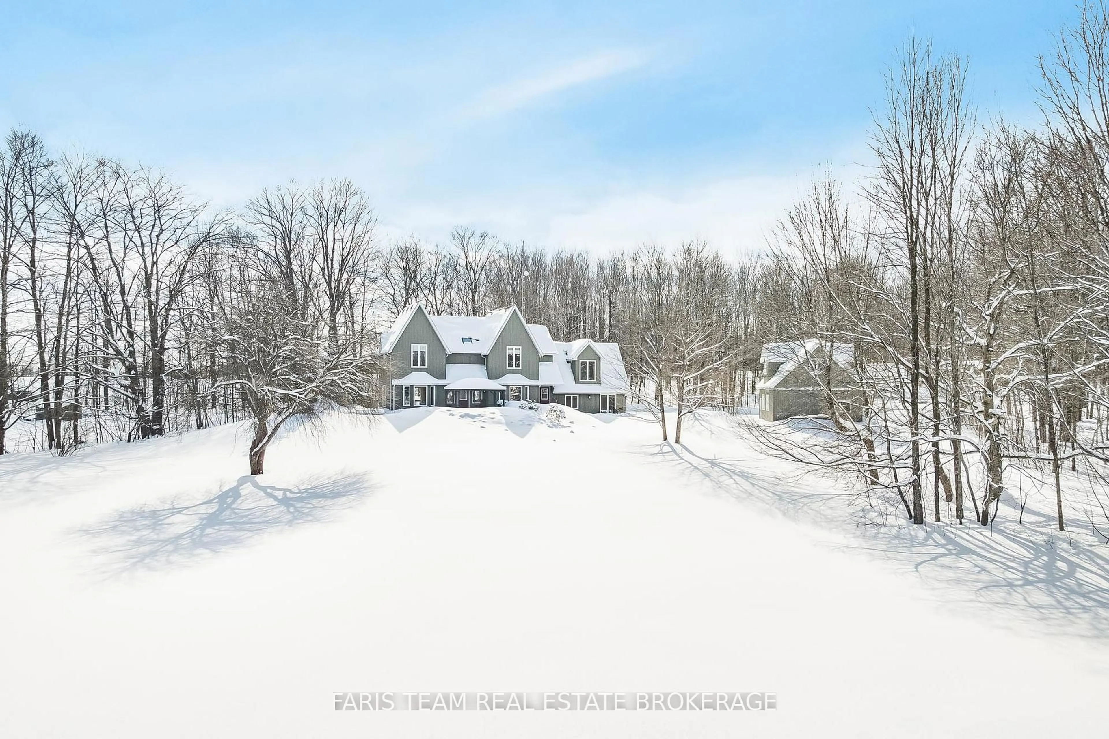 A pic from outside/outdoor area/front of a property/back of a property/a pic from drone, mountain view for 714329 Baseline Rd, Grey Highlands Ontario N0C 1E0