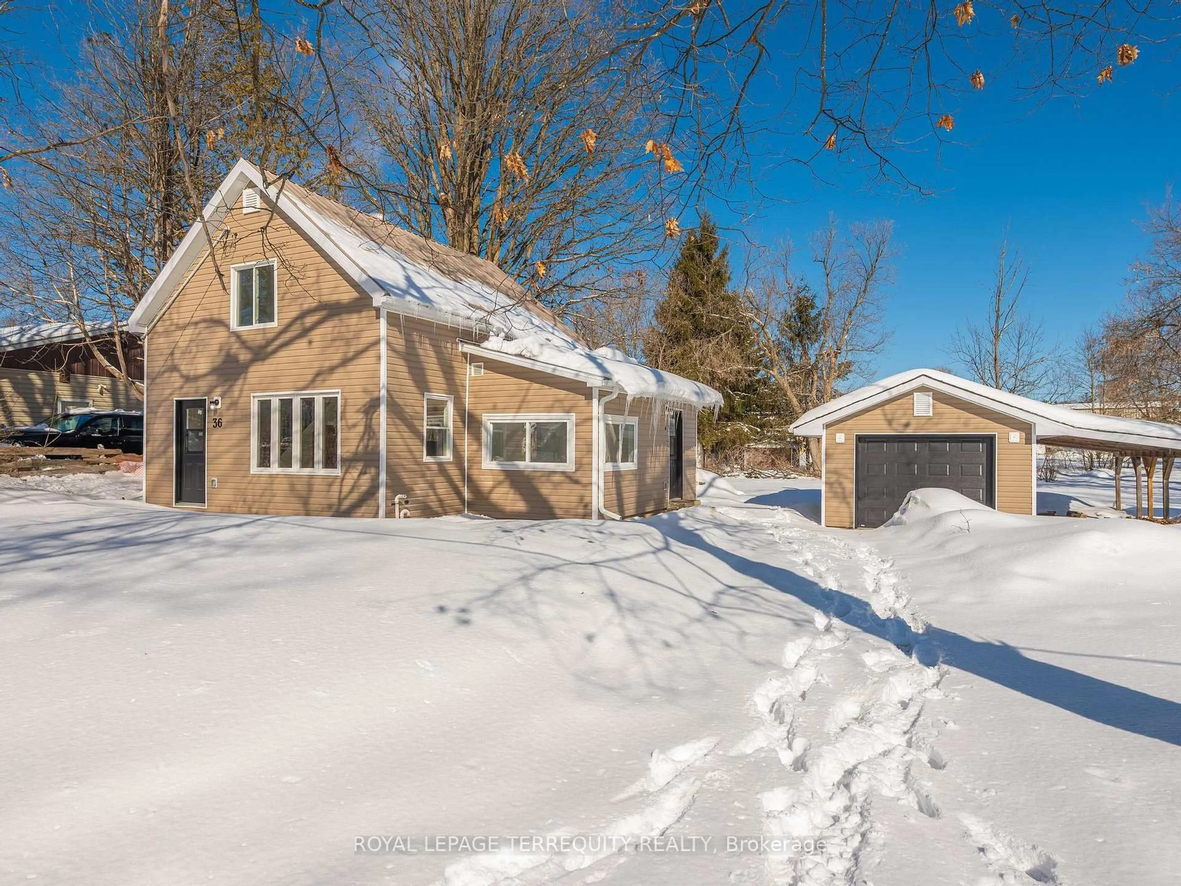 A pic from outside/outdoor area/front of a property/back of a property/a pic from drone, street for 36 Pearce St, Limoges Ontario K0K 2M0