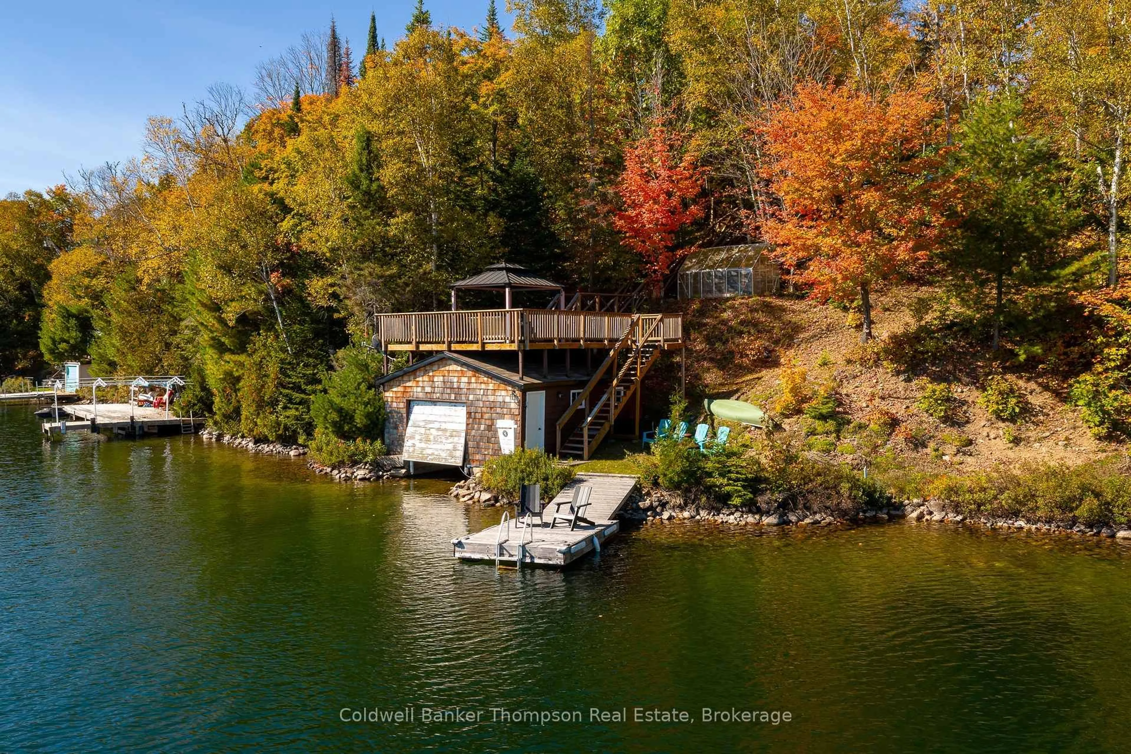 A pic from outside/outdoor area/front of a property/back of a property/a pic from drone, water/lake/river/ocean view for 57 Mayflower Lane, Perry Ontario P0A 1J0