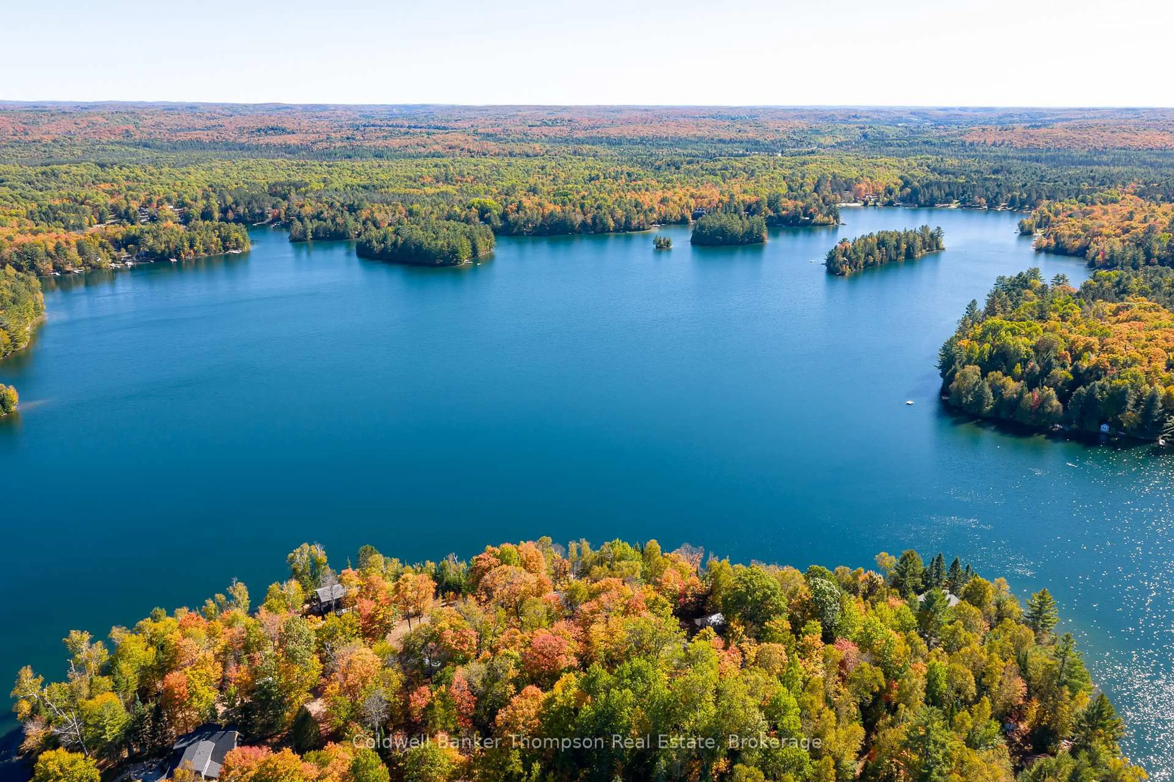 A pic from outside/outdoor area/front of a property/back of a property/a pic from drone, water/lake/river/ocean view for 57 Mayflower Lane, Perry Ontario P0A 1J0