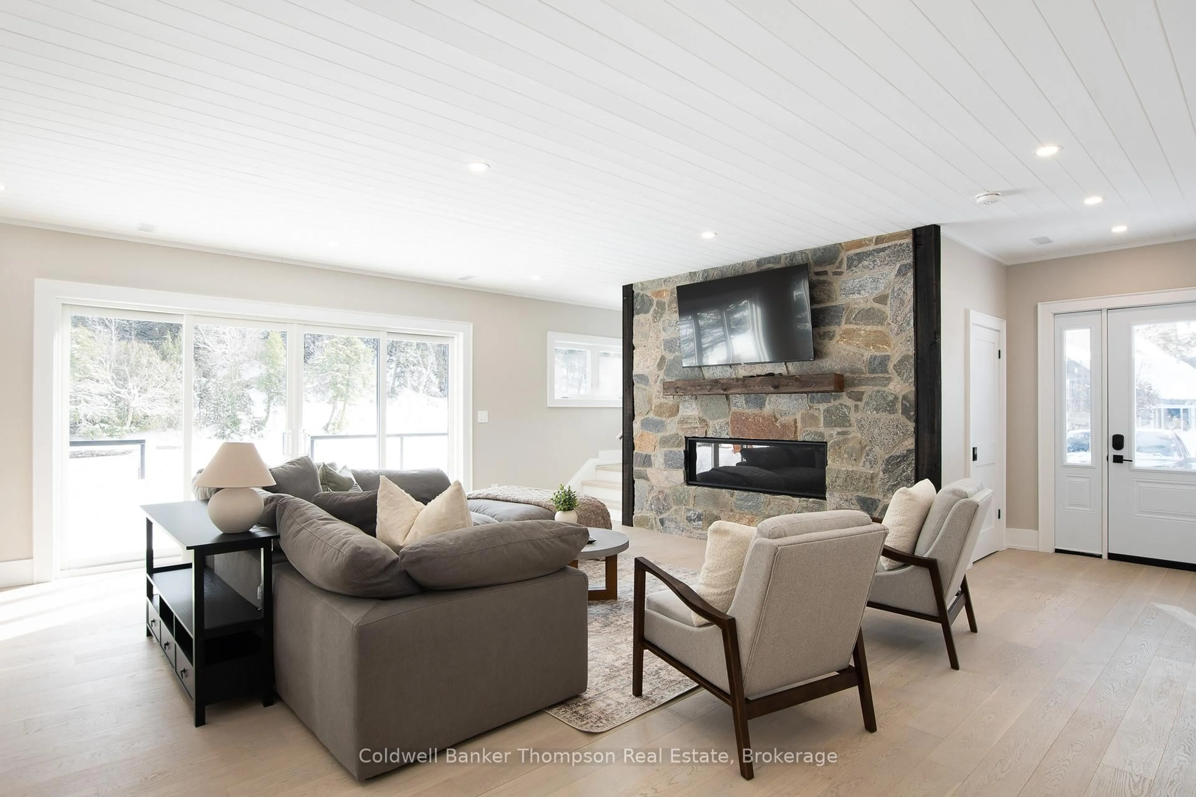 Living room with furniture, unknown for 32 Church St, Huntsville Ontario P1H 1G8