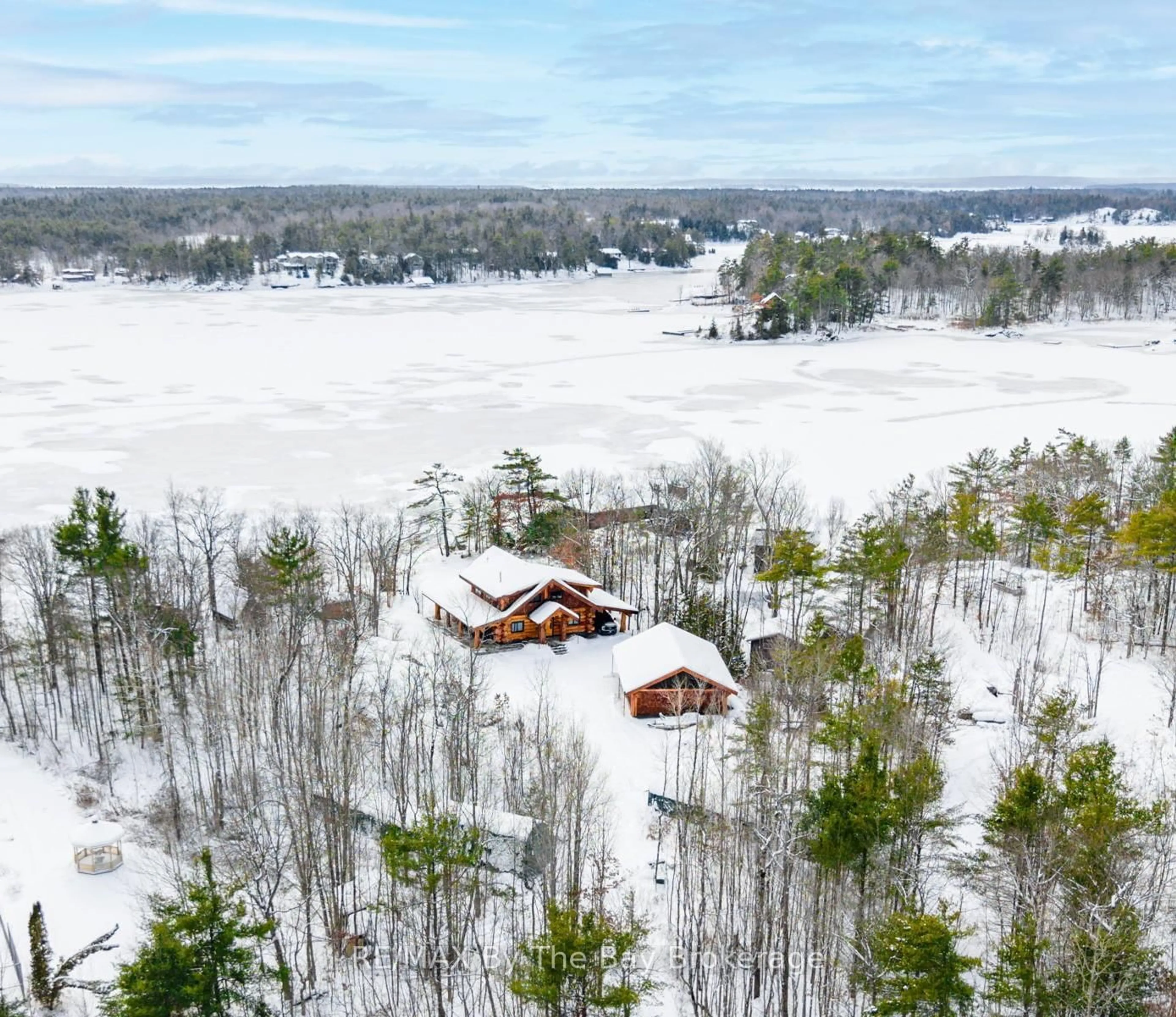 A pic from outside/outdoor area/front of a property/back of a property/a pic from drone, water/lake/river/ocean view for 189 Koetsier Lane, Georgian Bay Ontario P0E 1E0