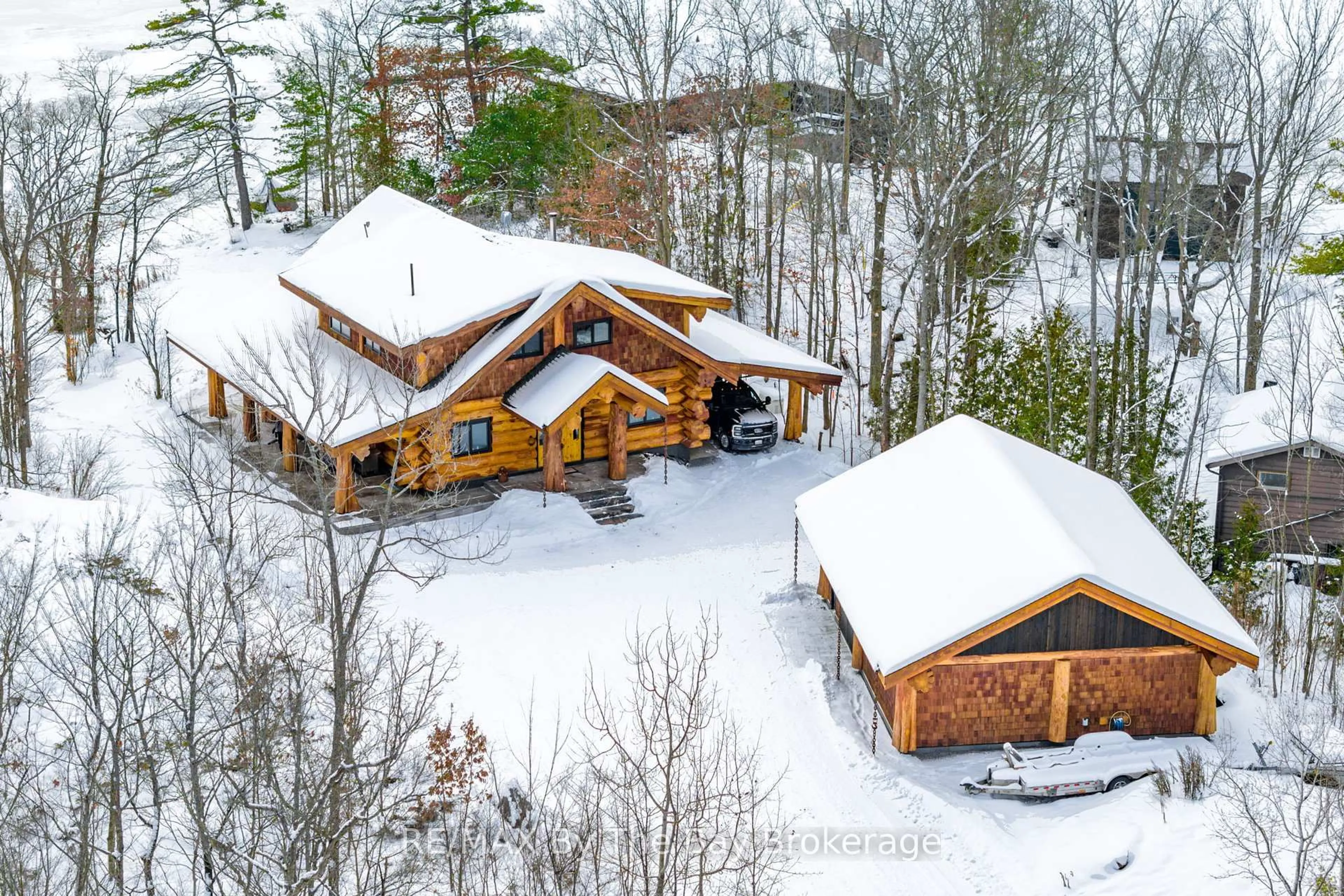 A pic from outside/outdoor area/front of a property/back of a property/a pic from drone, unknown for 189 Koetsier Lane, Georgian Bay Ontario P0E 1E0