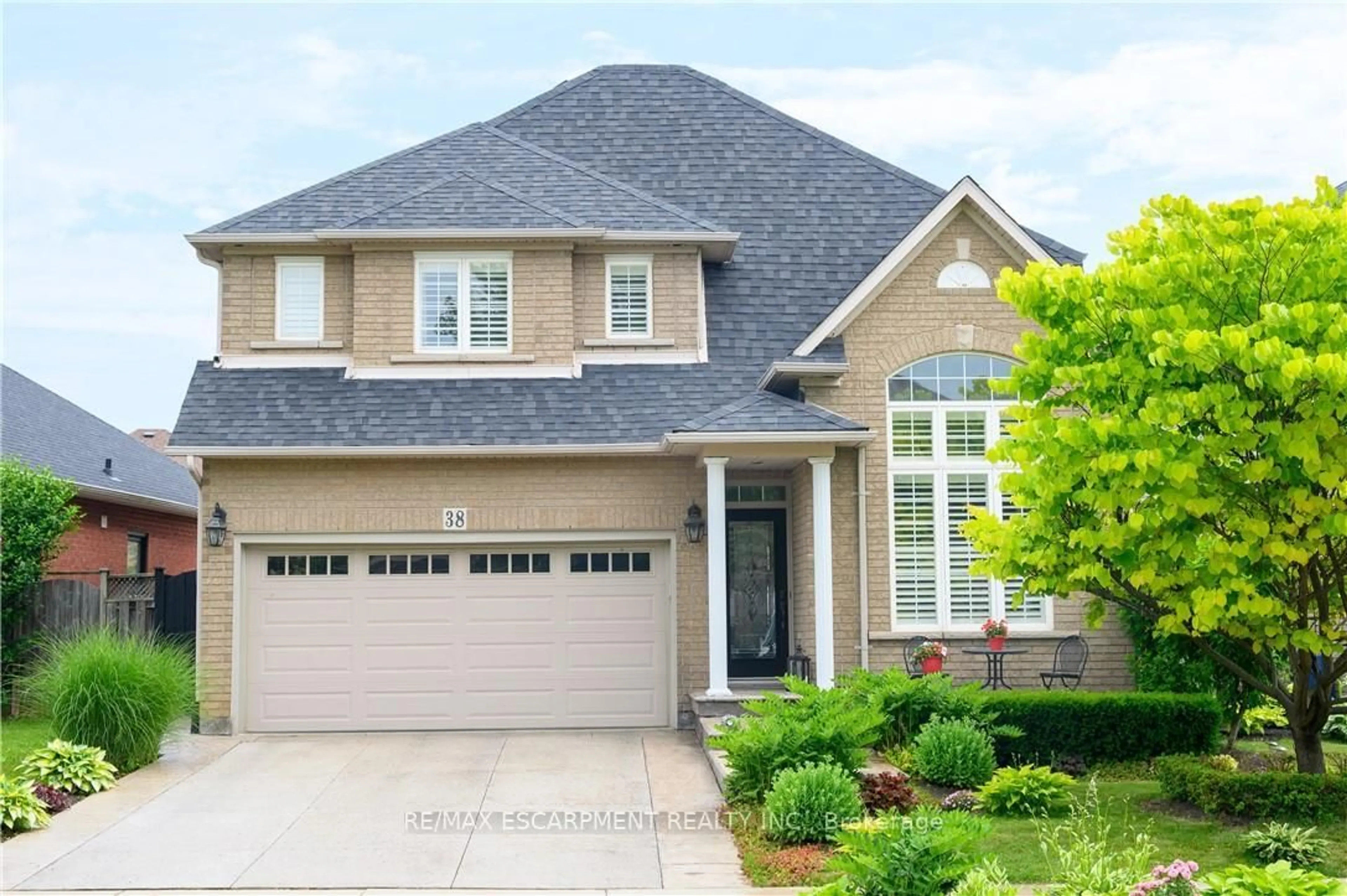 Home with brick exterior material, street for 38 Sunbeam Dr, Hamilton Ontario L9B 2X9