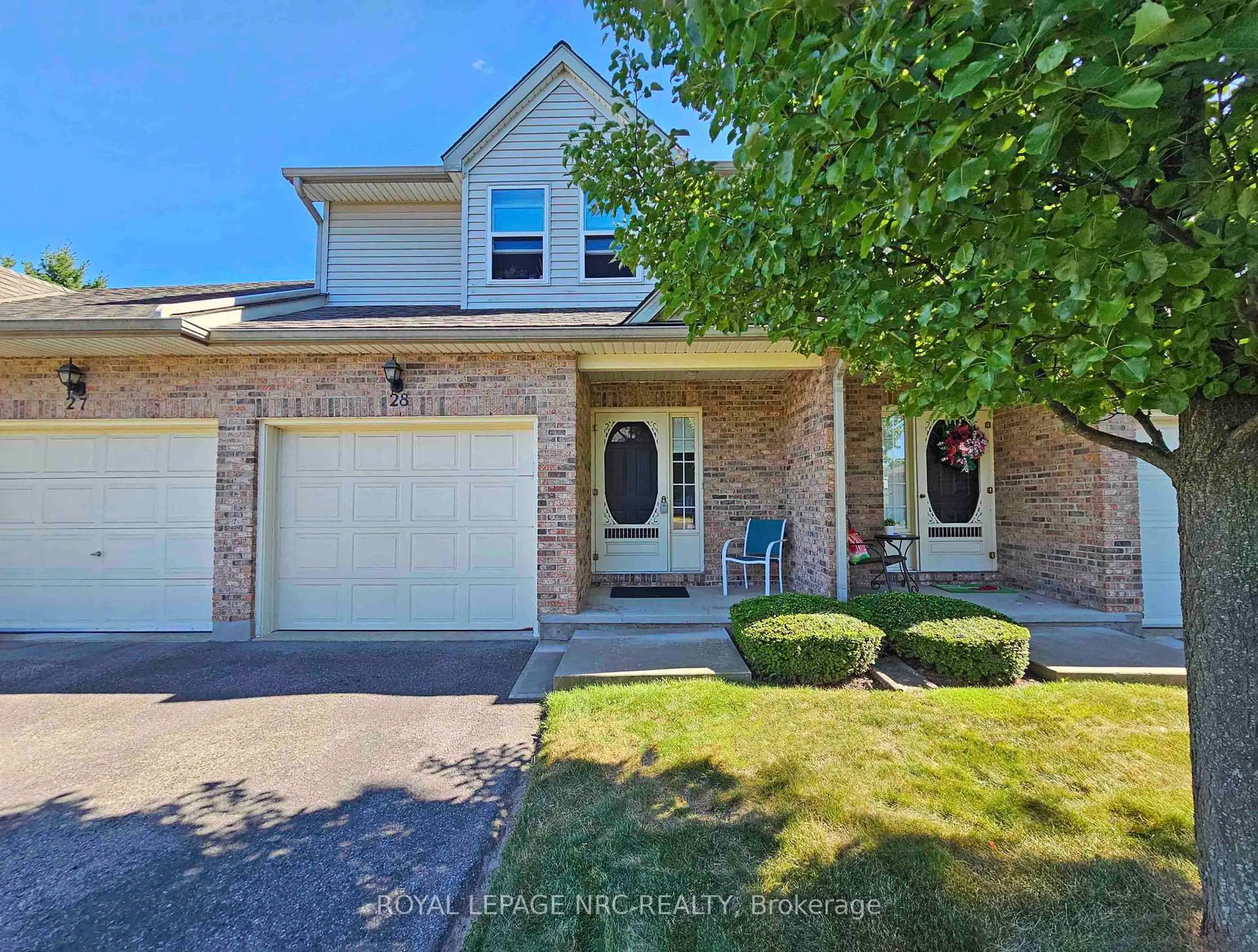 Home with brick exterior material, street for 5070 drummond Rd #28, Niagara Falls Ontario L2E 6E4