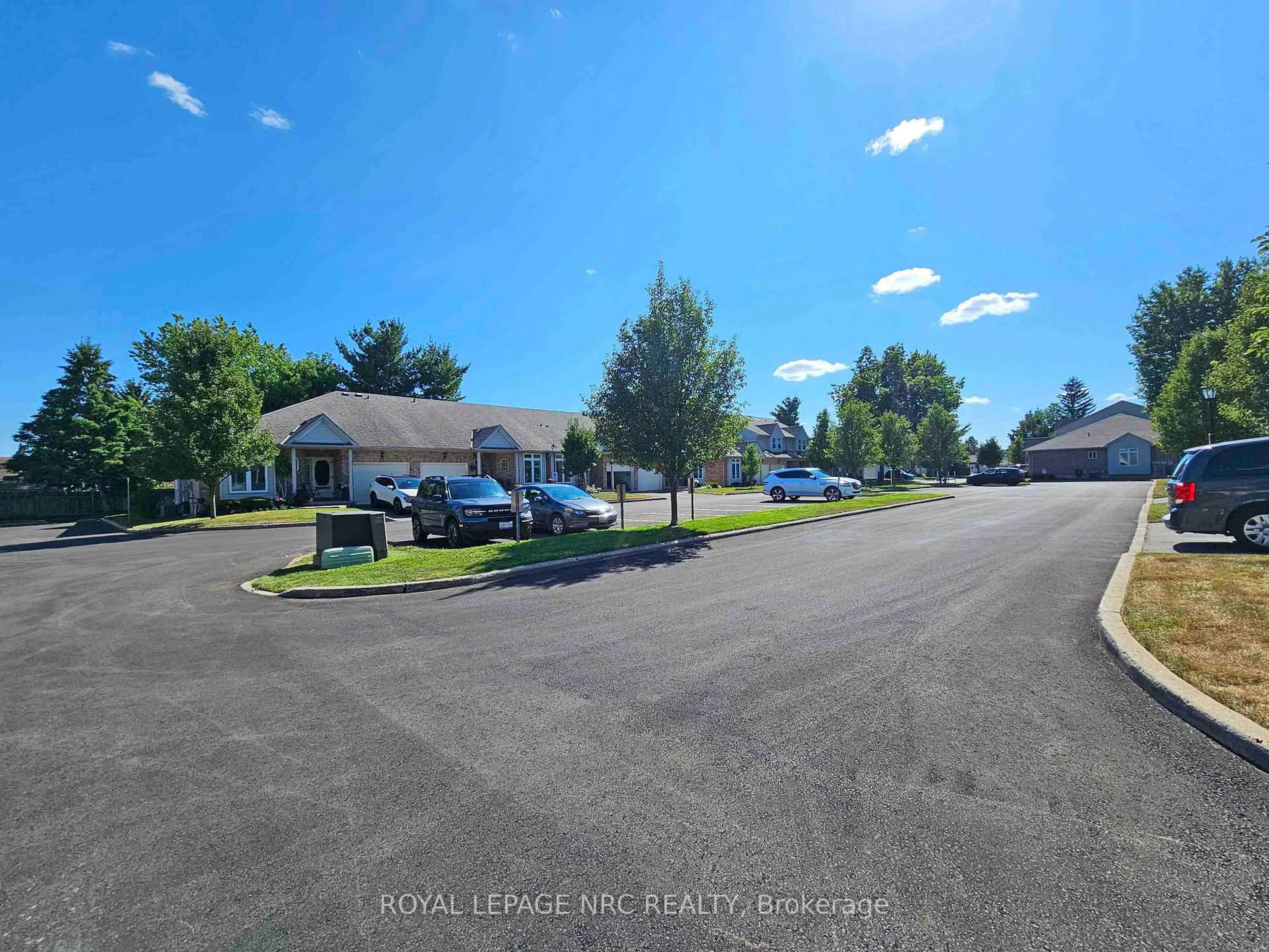 A pic from outside/outdoor area/front of a property/back of a property/a pic from drone, street for 5070 drummond Rd #28, Niagara Falls Ontario L2E 6E4