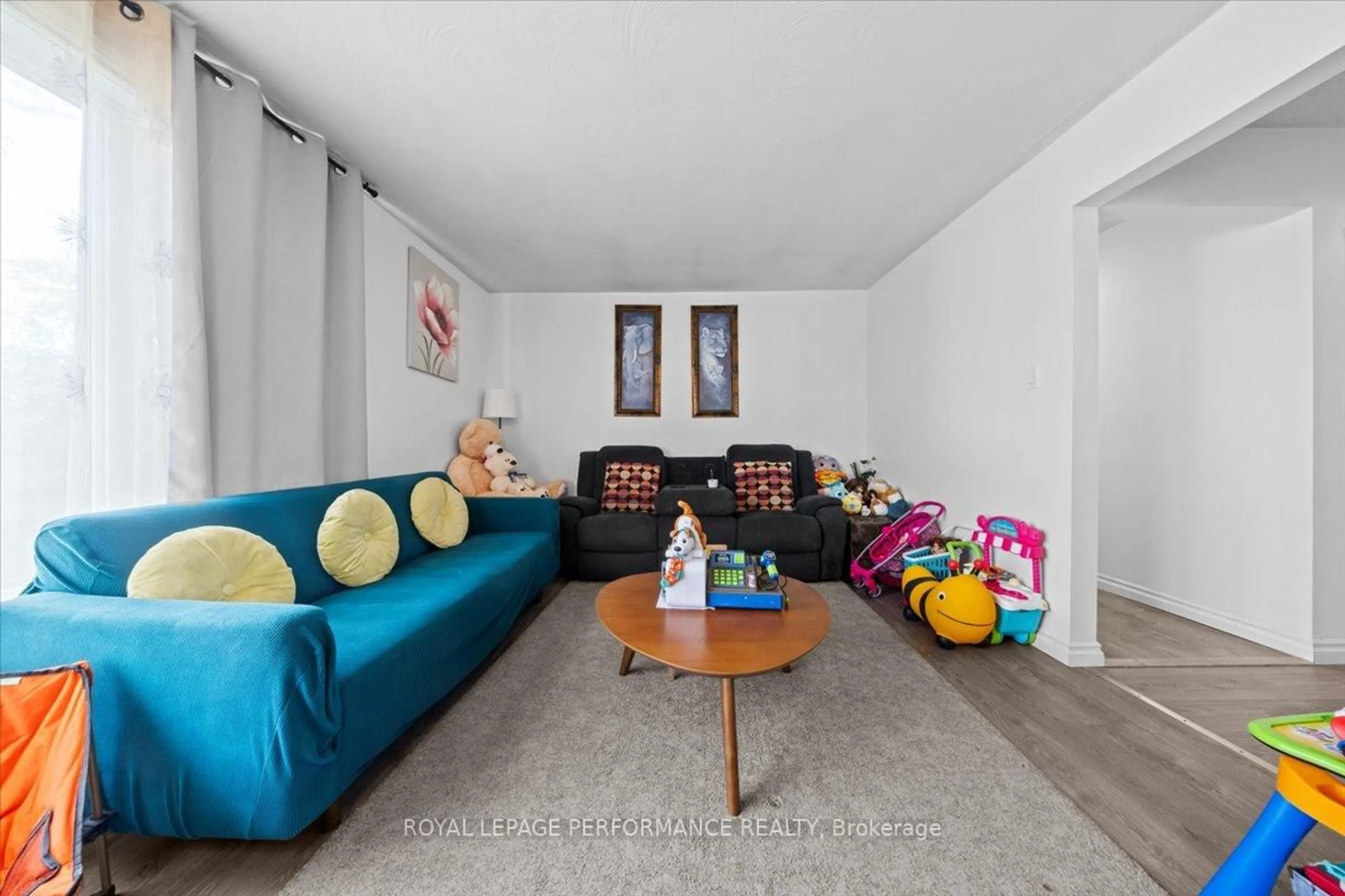 Living room with furniture, carpet floor for 1702 Russell Rd, Ottawa Ontario K1G 0M9