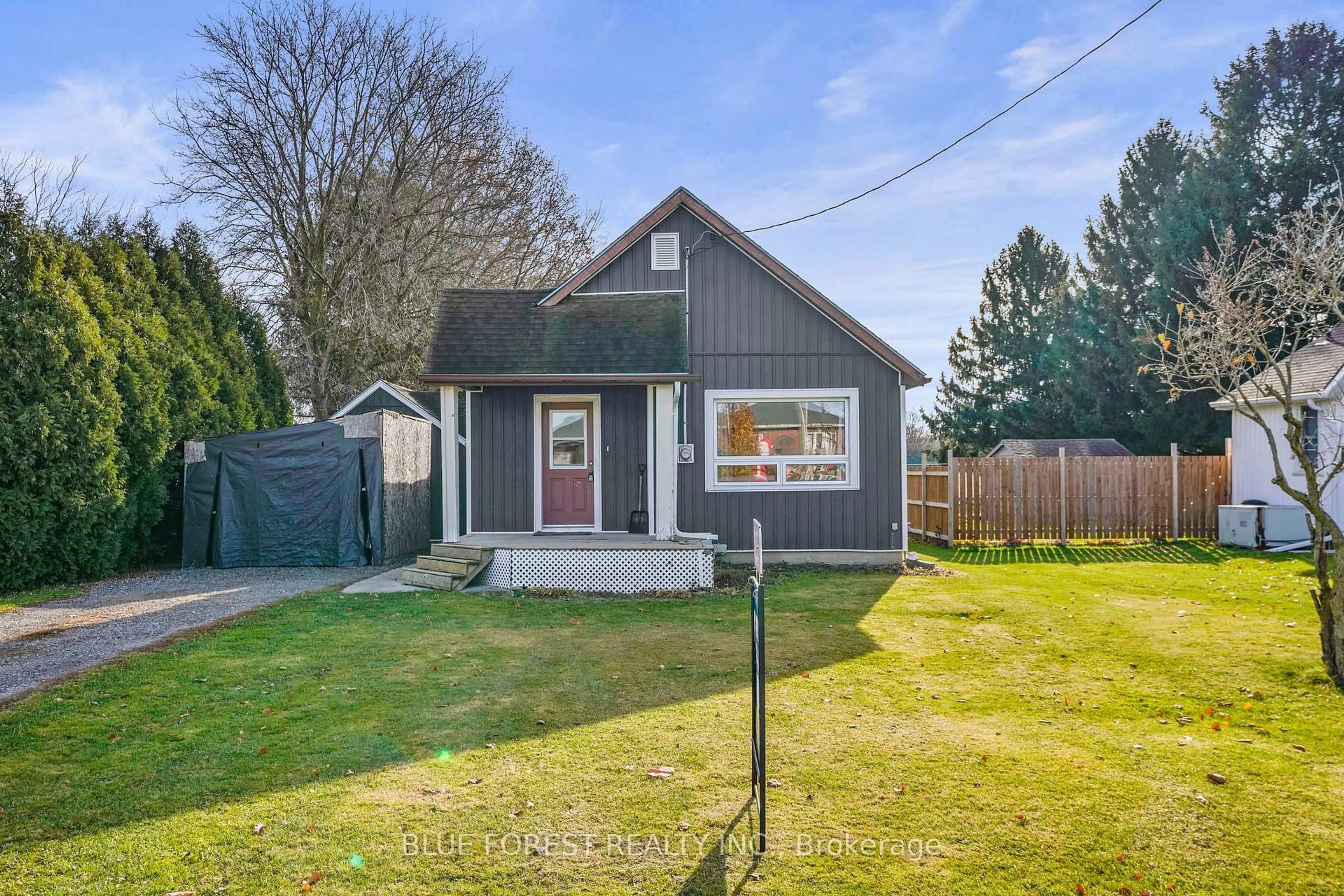 A pic from outside/outdoor area/front of a property/back of a property/a pic from drone, street for 22557 Queens Line, West Elgin Ontario N0L 2C0