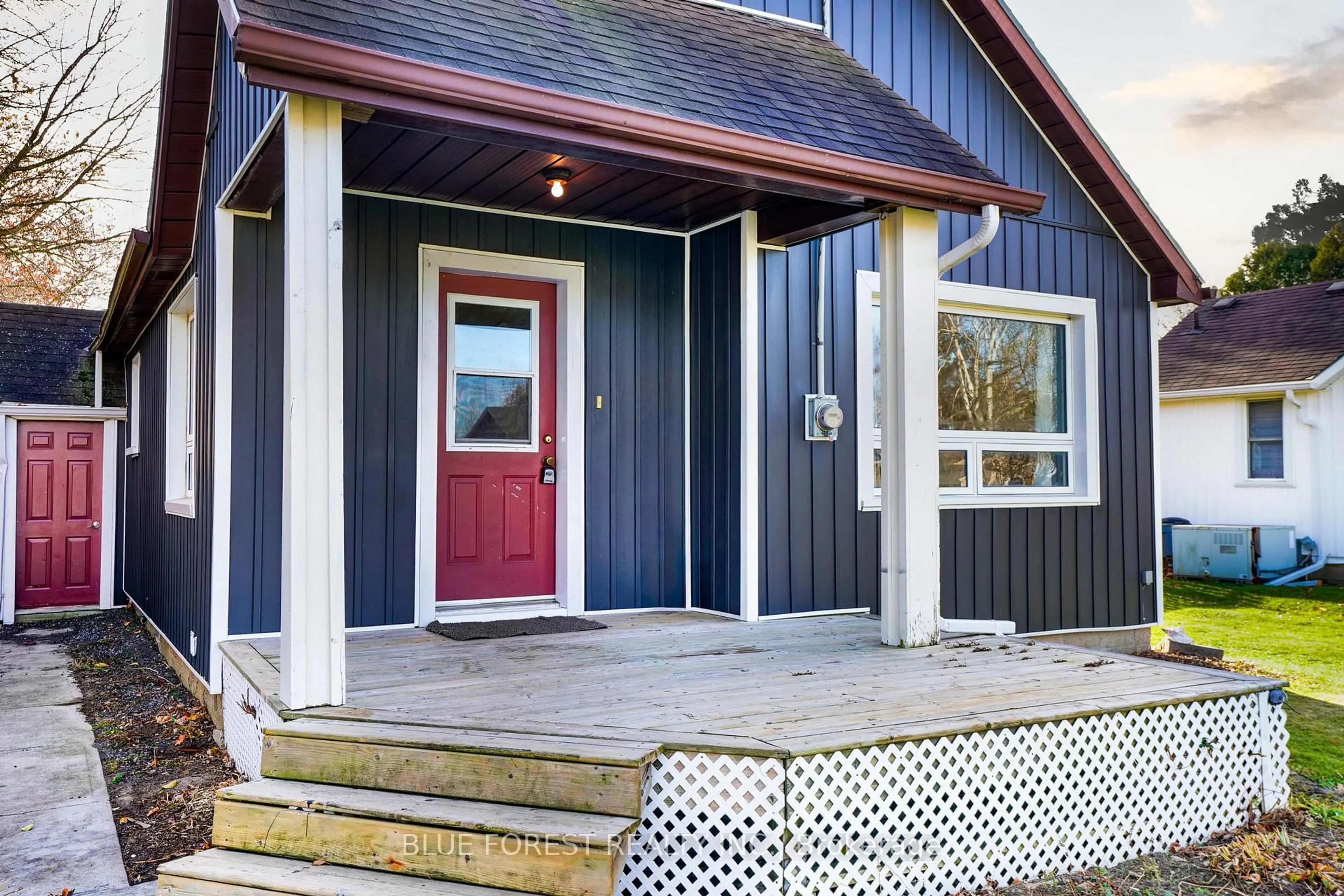 Home with vinyl exterior material, street for 22557 Queens Line, West Elgin Ontario N0L 2C0