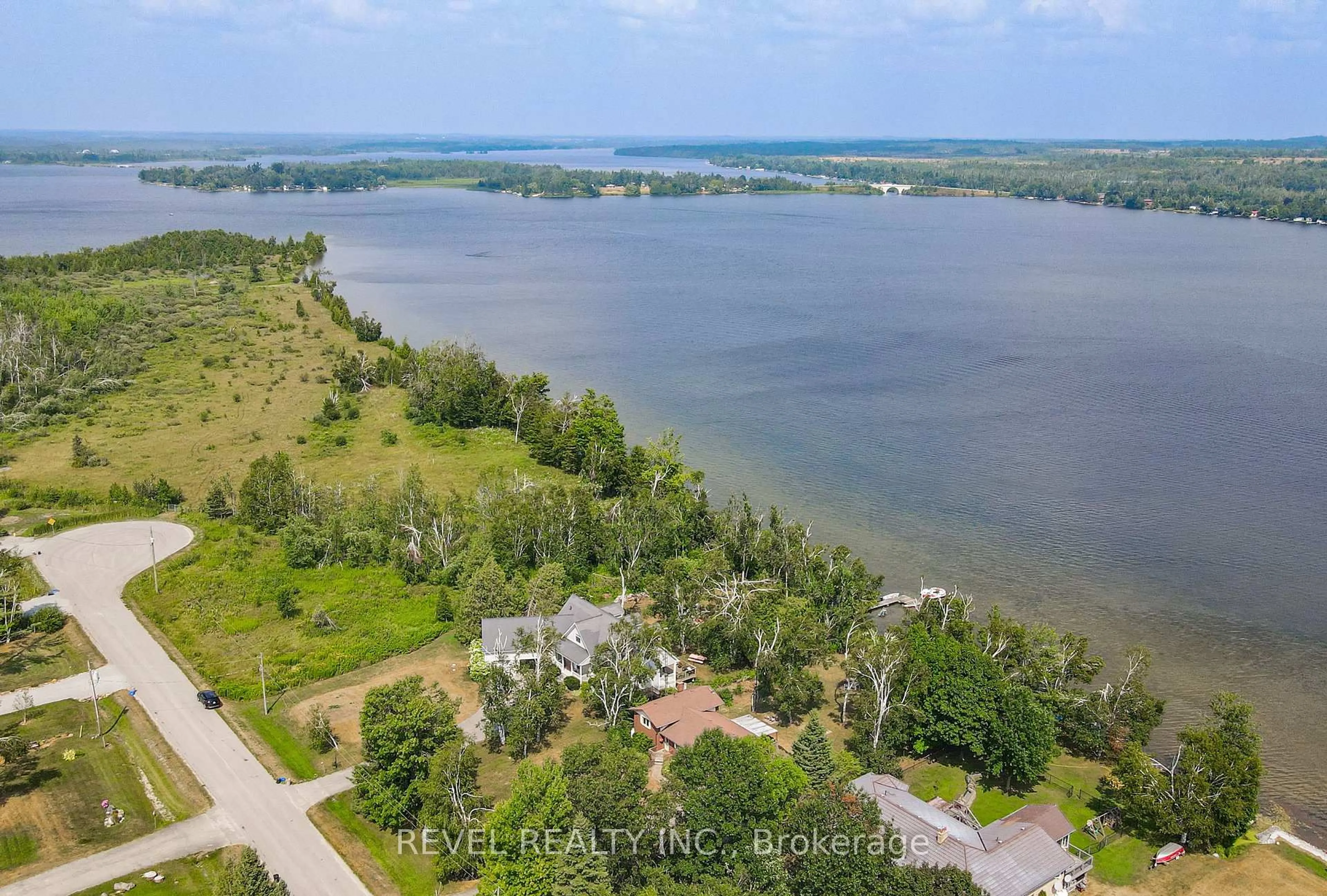 A pic from outside/outdoor area/front of a property/back of a property/a pic from drone, water/lake/river/ocean view for 126 Pinewood Blvd, Kawartha Lakes Ontario K0M 2T0