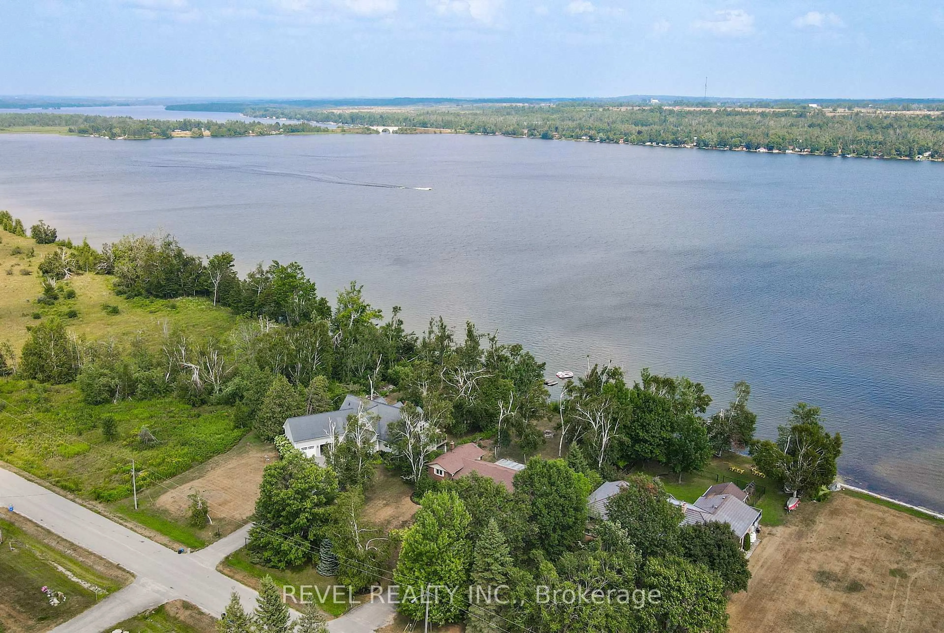 A pic from outside/outdoor area/front of a property/back of a property/a pic from drone, water/lake/river/ocean view for 126 Pinewood Blvd, Kawartha Lakes Ontario K0M 2T0