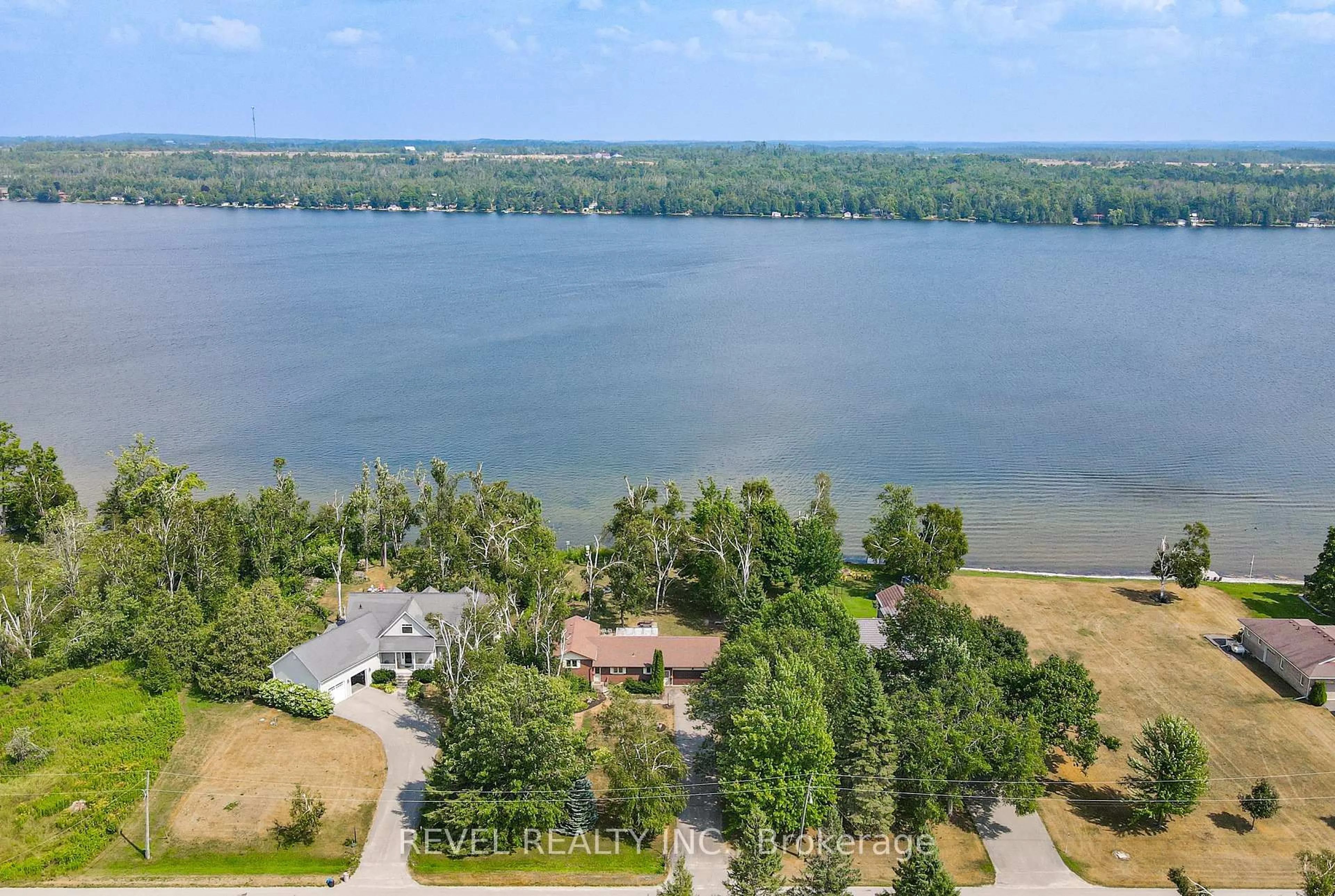 A pic from outside/outdoor area/front of a property/back of a property/a pic from drone, water/lake/river/ocean view for 126 Pinewood Blvd, Kawartha Lakes Ontario K0M 2T0