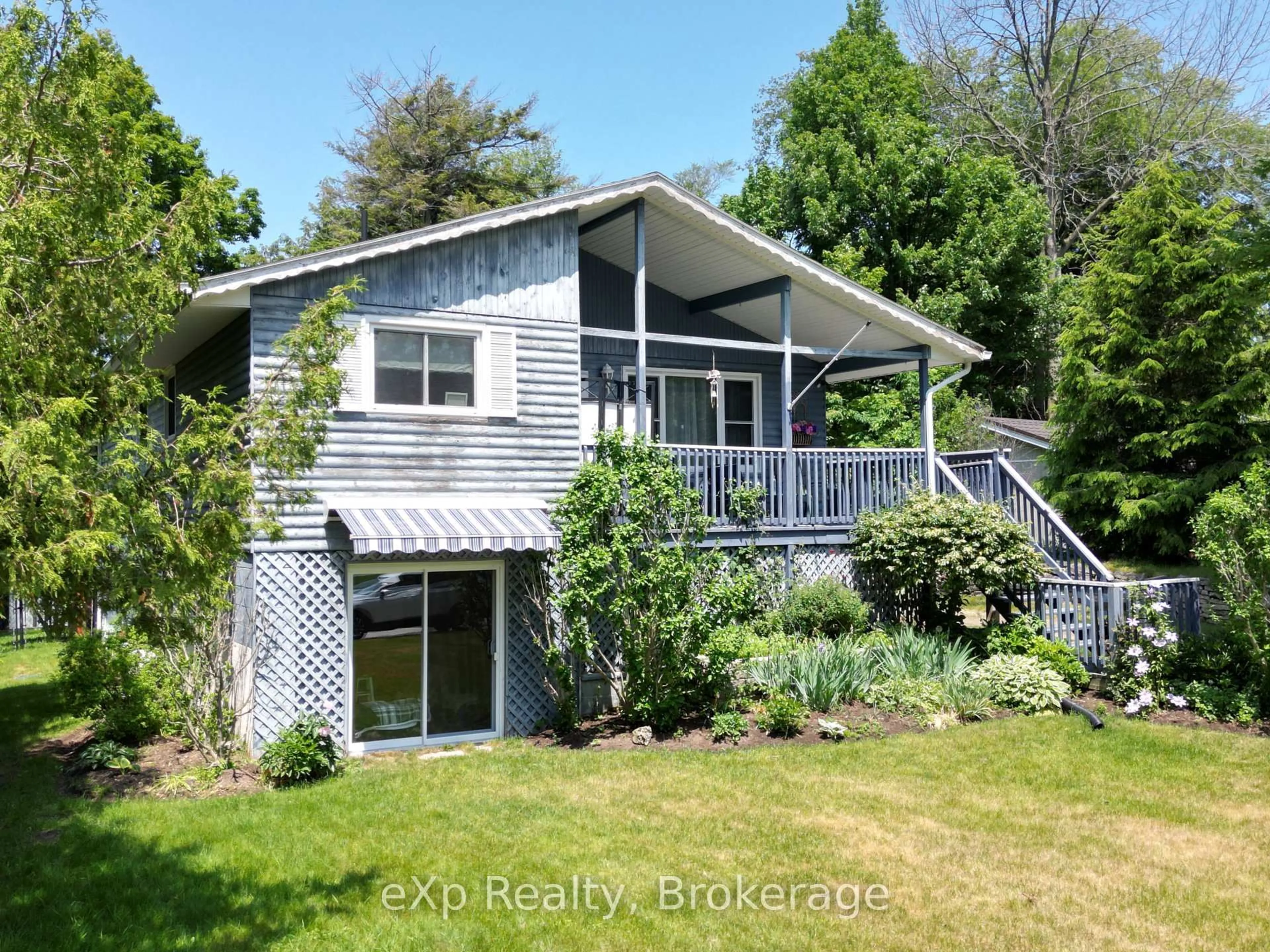 A pic from outside/outdoor area/front of a property/back of a property/a pic from drone, water/lake/river/ocean view for 105 Menomini Rd, Huron-Kinloss Ontario N2Z 2X3