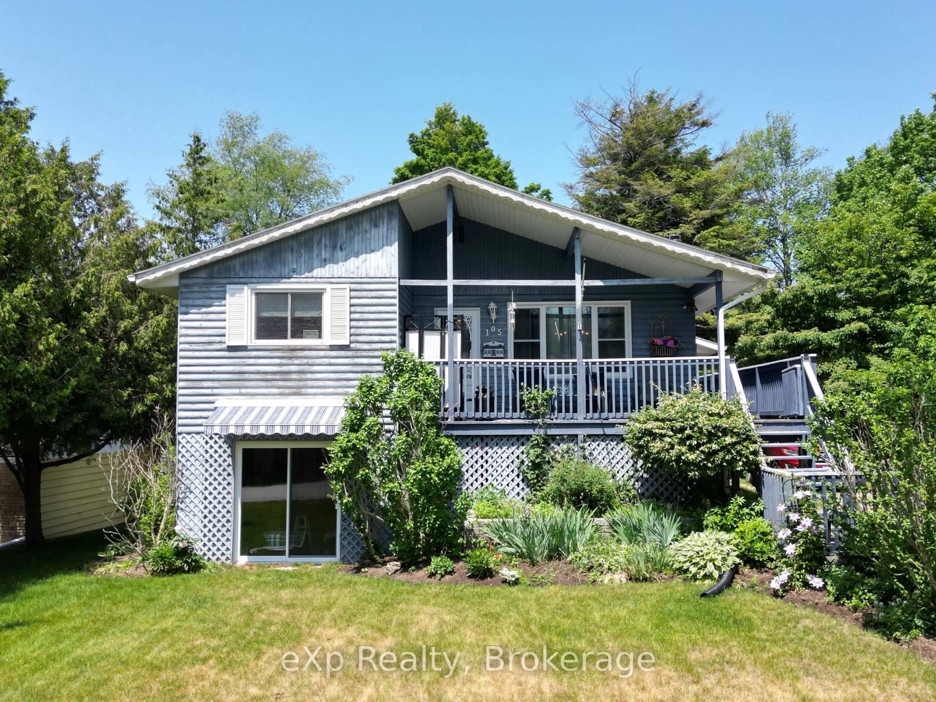 Home with vinyl exterior material, water/lake/river/ocean view for 105 Menomini Rd, Huron-Kinloss Ontario N2Z 2X3