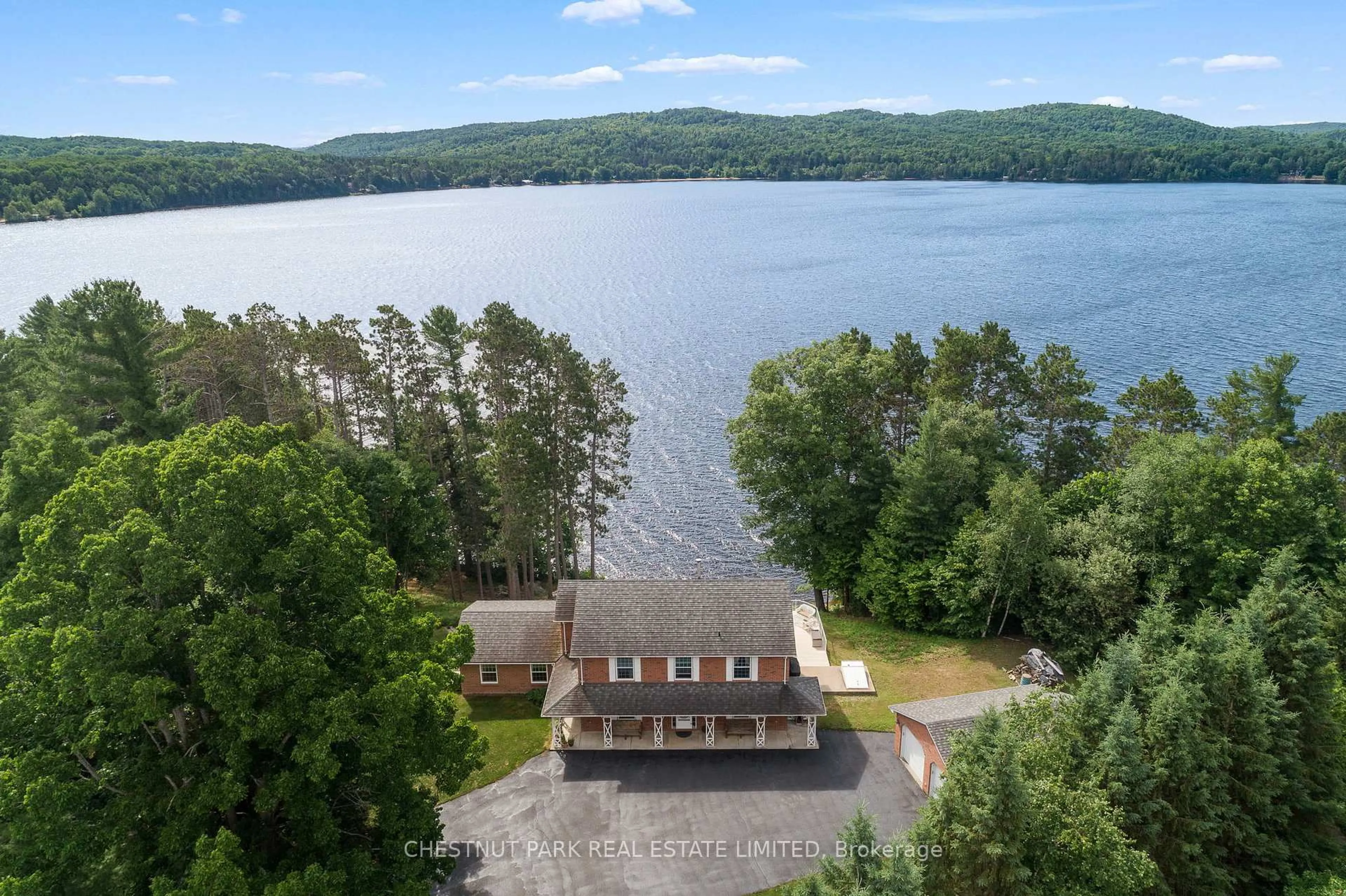 A pic from outside/outdoor area/front of a property/back of a property/a pic from drone, water/lake/river/ocean view for 318 Mask Island Dr, Barry's Bay Ontario K0J 1B0