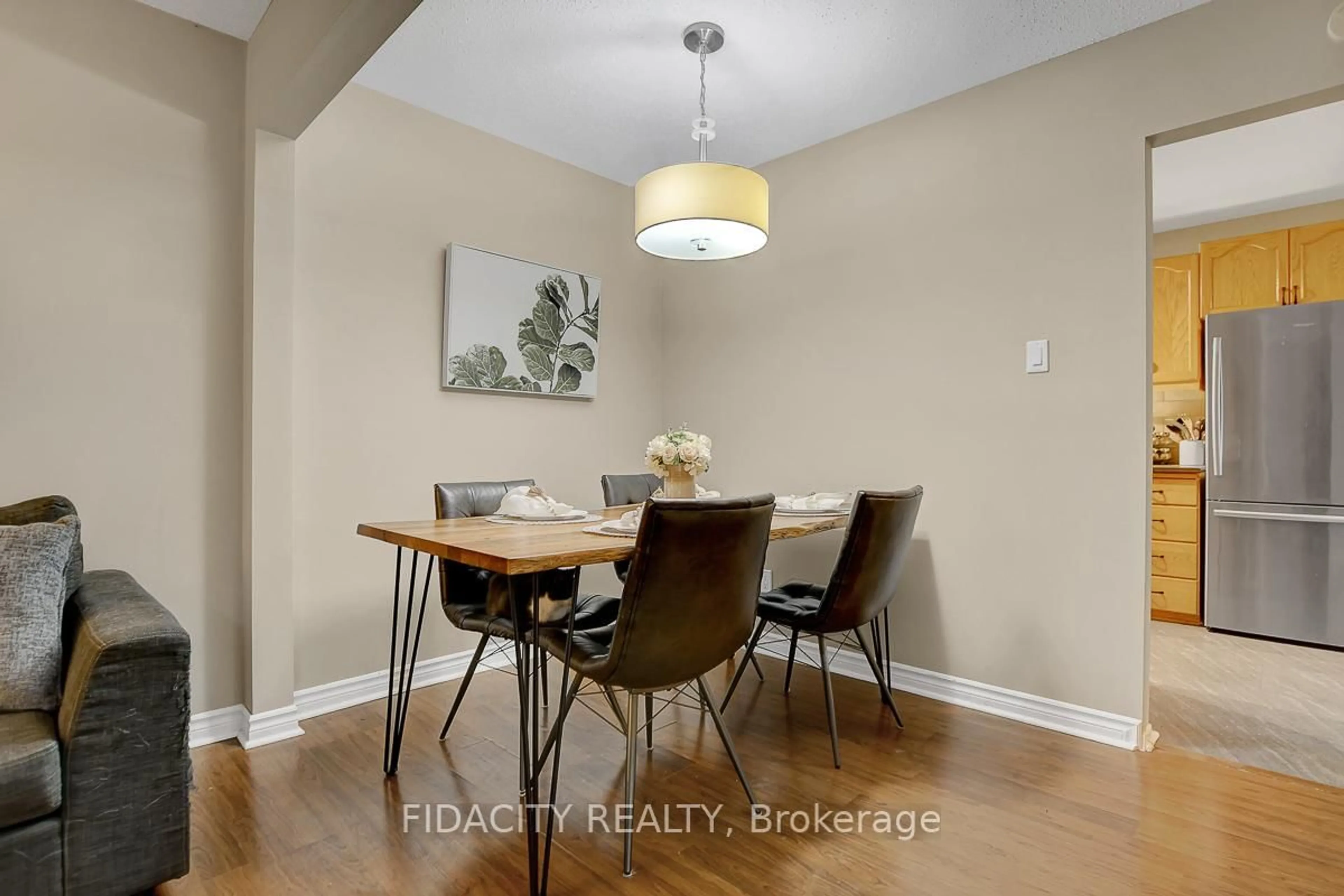 Dining room, wood/laminate floor for 159 Salter Cres #61, Kanata Ontario K2K 1Y8