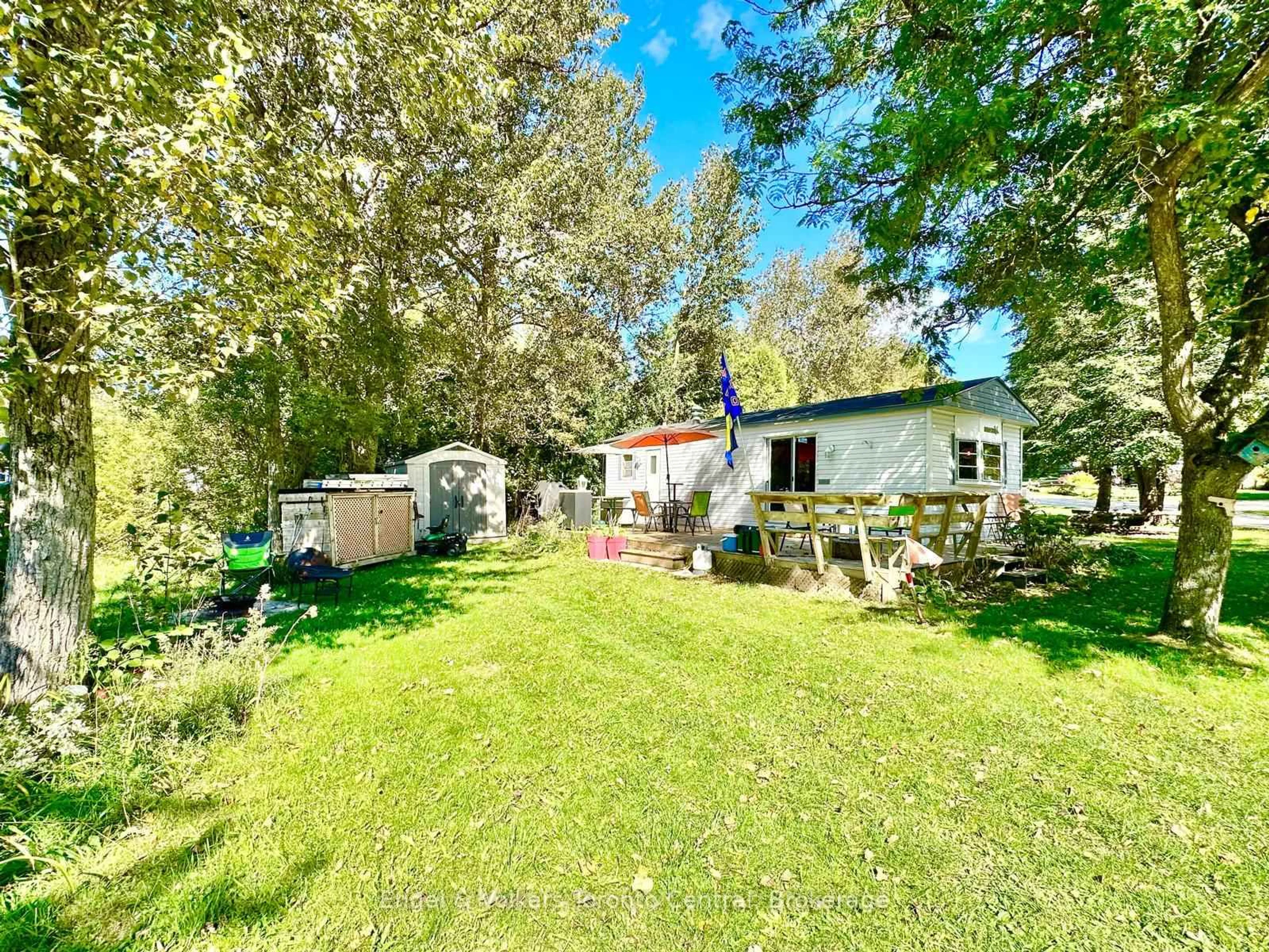A pic from outside/outdoor area/front of a property/back of a property/a pic from drone, forest/trees view for 7489 SIDEROAD 5 E #E 14, Wellington North Ontario N0G 2L0
