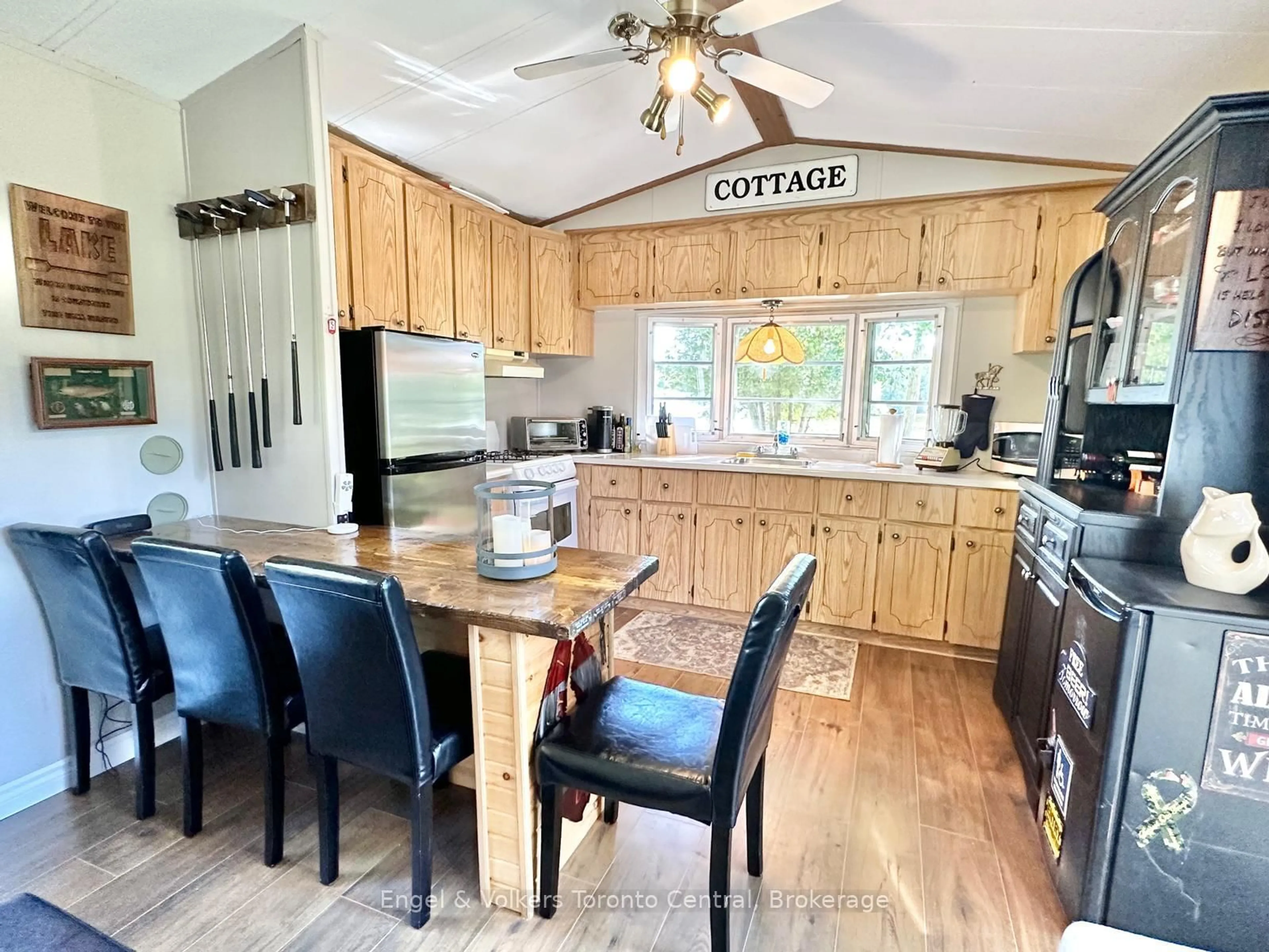 Open concept kitchen, wood/laminate floor for 7489 SIDEROAD 5 E #E 14, Wellington North Ontario N0G 2L0
