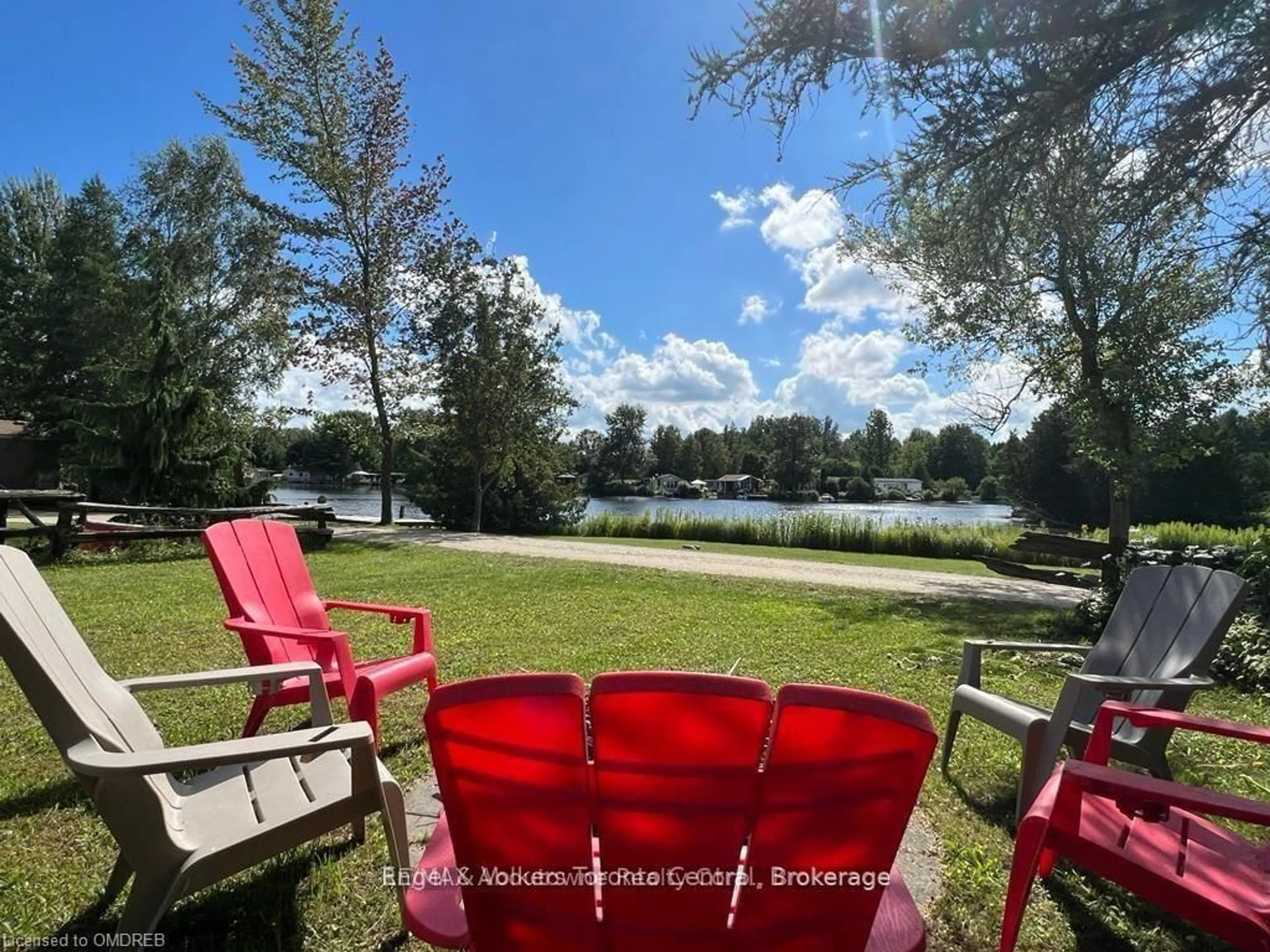A pic from outside/outdoor area/front of a property/back of a property/a pic from drone, water/lake/river/ocean view for 7489 SIDEROAD 5 E #L 9, Wellington North Ontario N0G 2L0