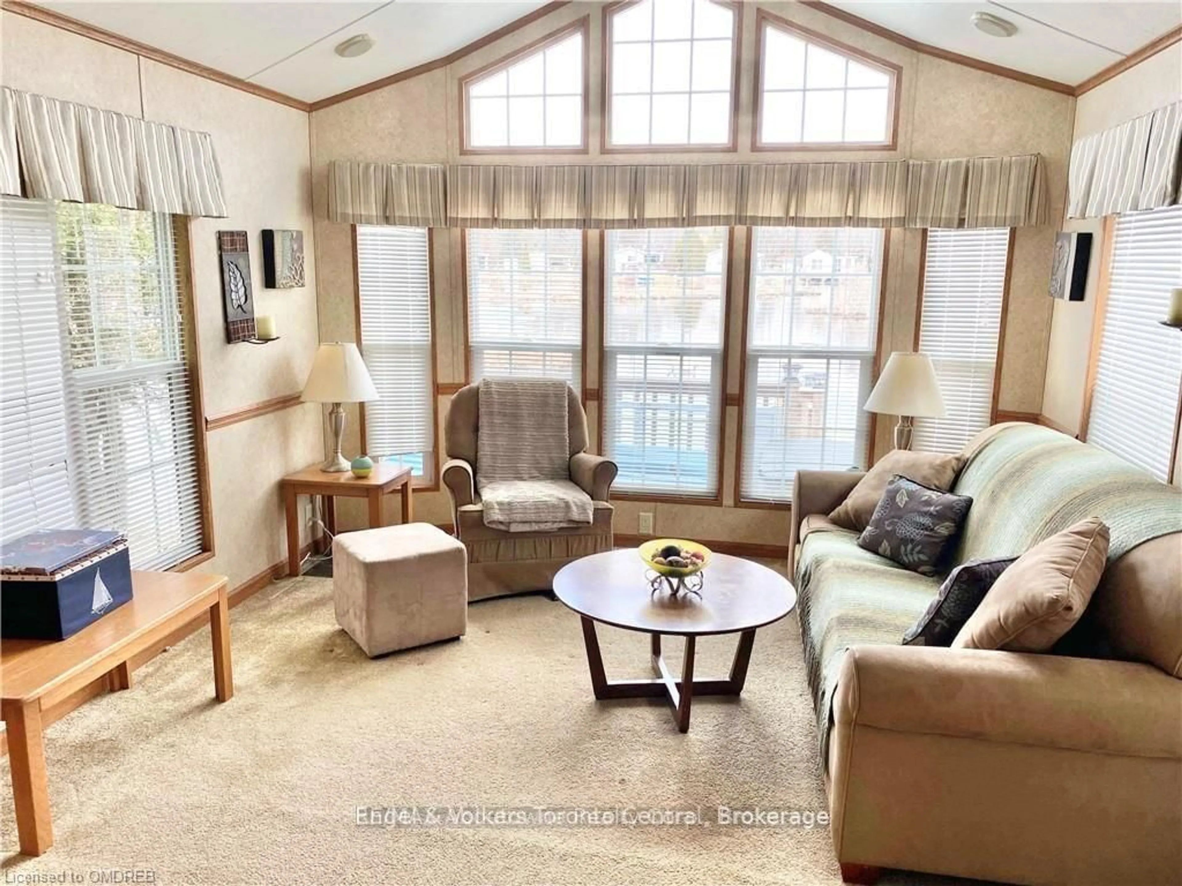 Living room with furniture, unknown for 7489 SIDEROAD 5 #T106, Wellington North Ontario N0G 2L0