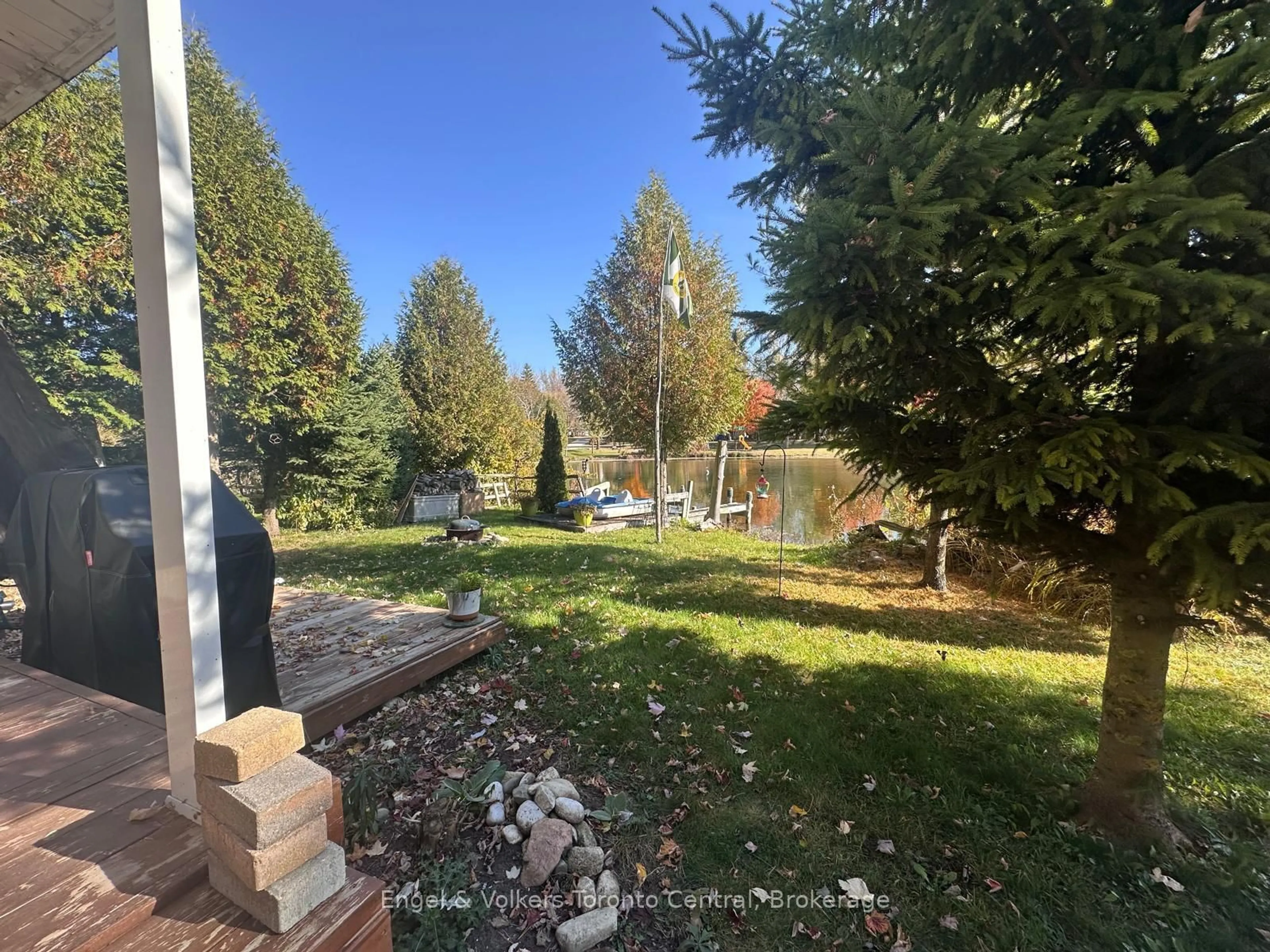 A pic from outside/outdoor area/front of a property/back of a property/a pic from drone, forest/trees view for 7489 SIDEROAD 5 #E7, Wellington North Ontario N0G 2L0