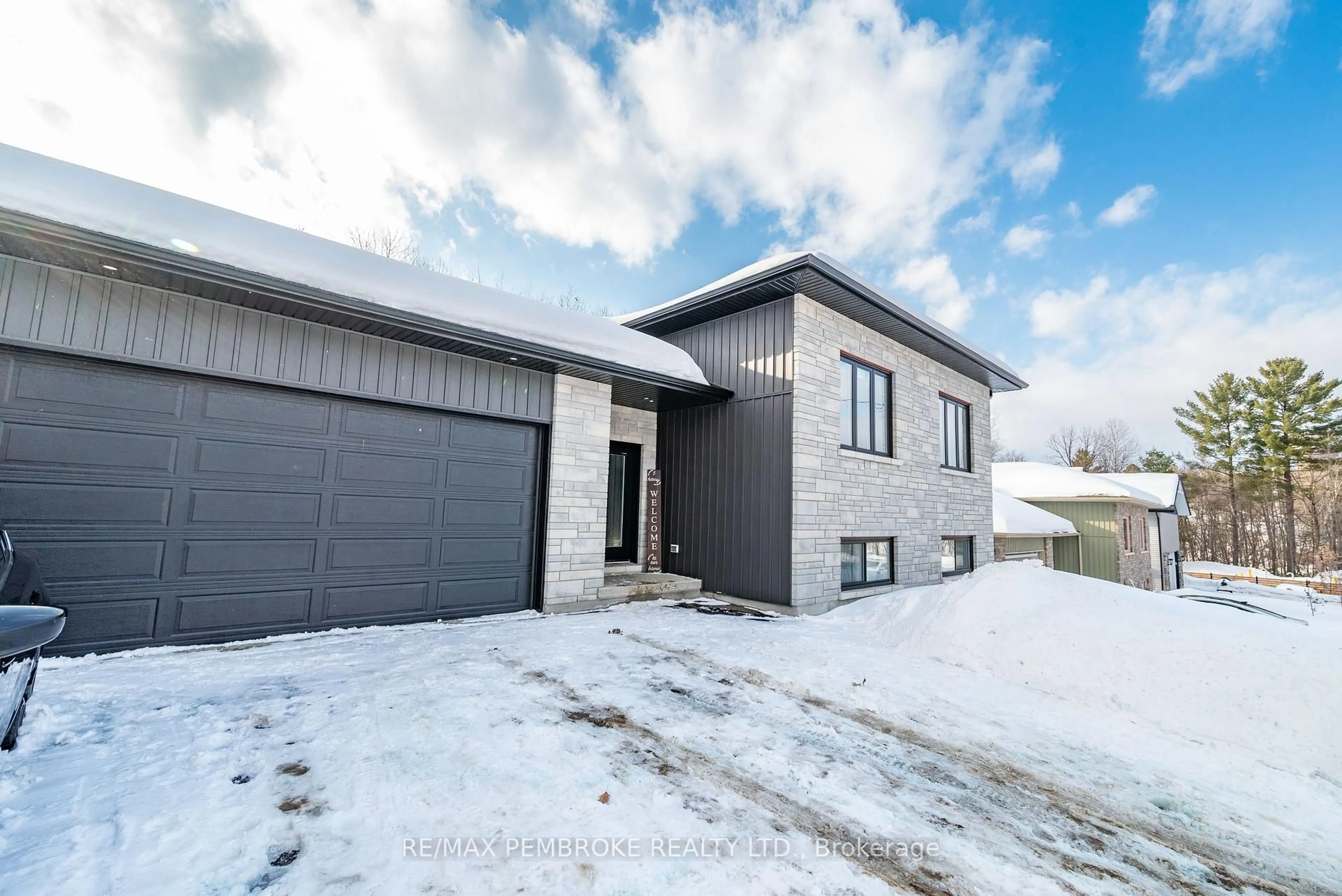 A pic from outside/outdoor area/front of a property/back of a property/a pic from drone, street for 5 Harry St, Petawawa Ontario K8H 2A5