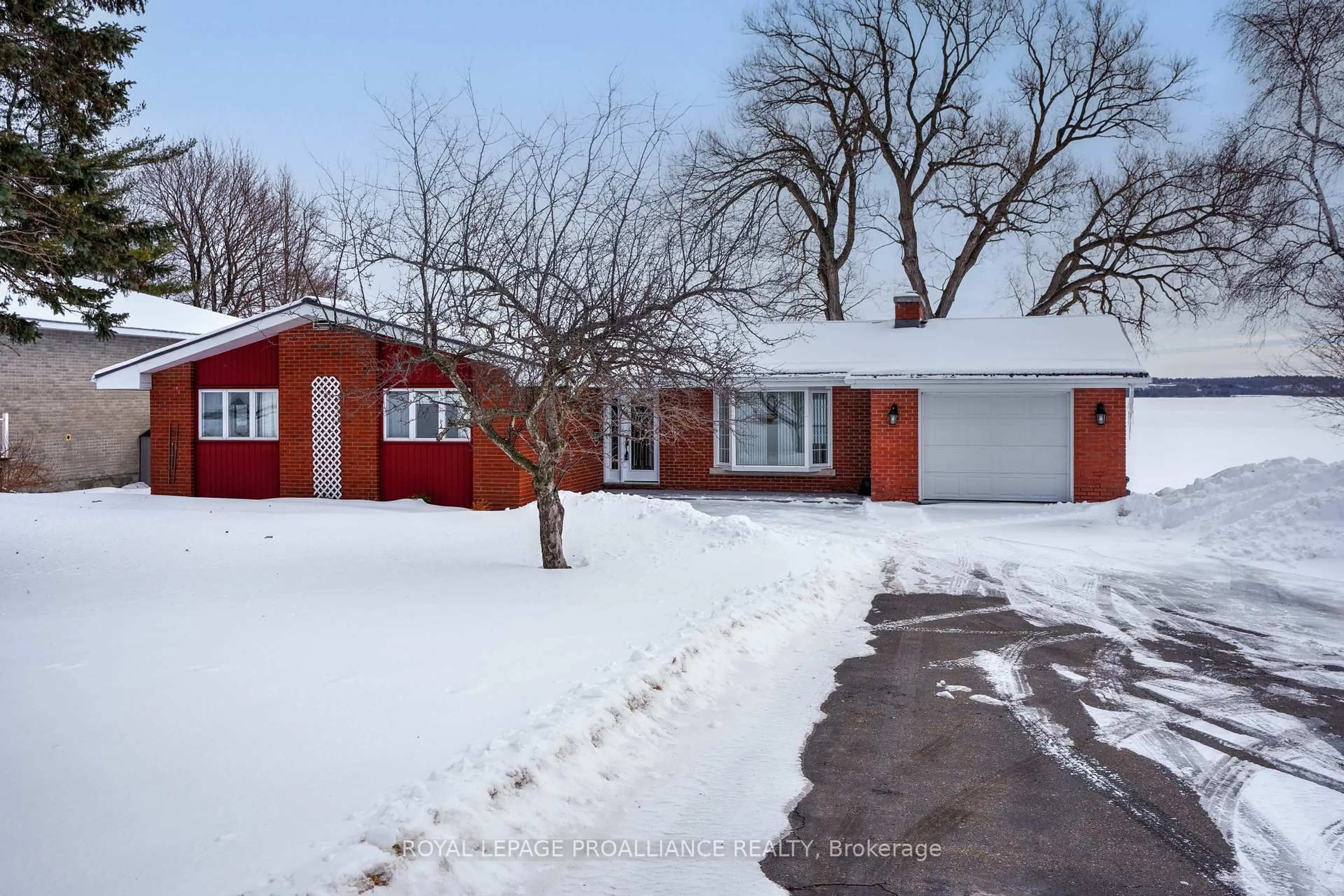 A pic from outside/outdoor area/front of a property/back of a property/a pic from drone, street for 1675 County Rd 2 Rd, Prescott Ontario K0E 1T0