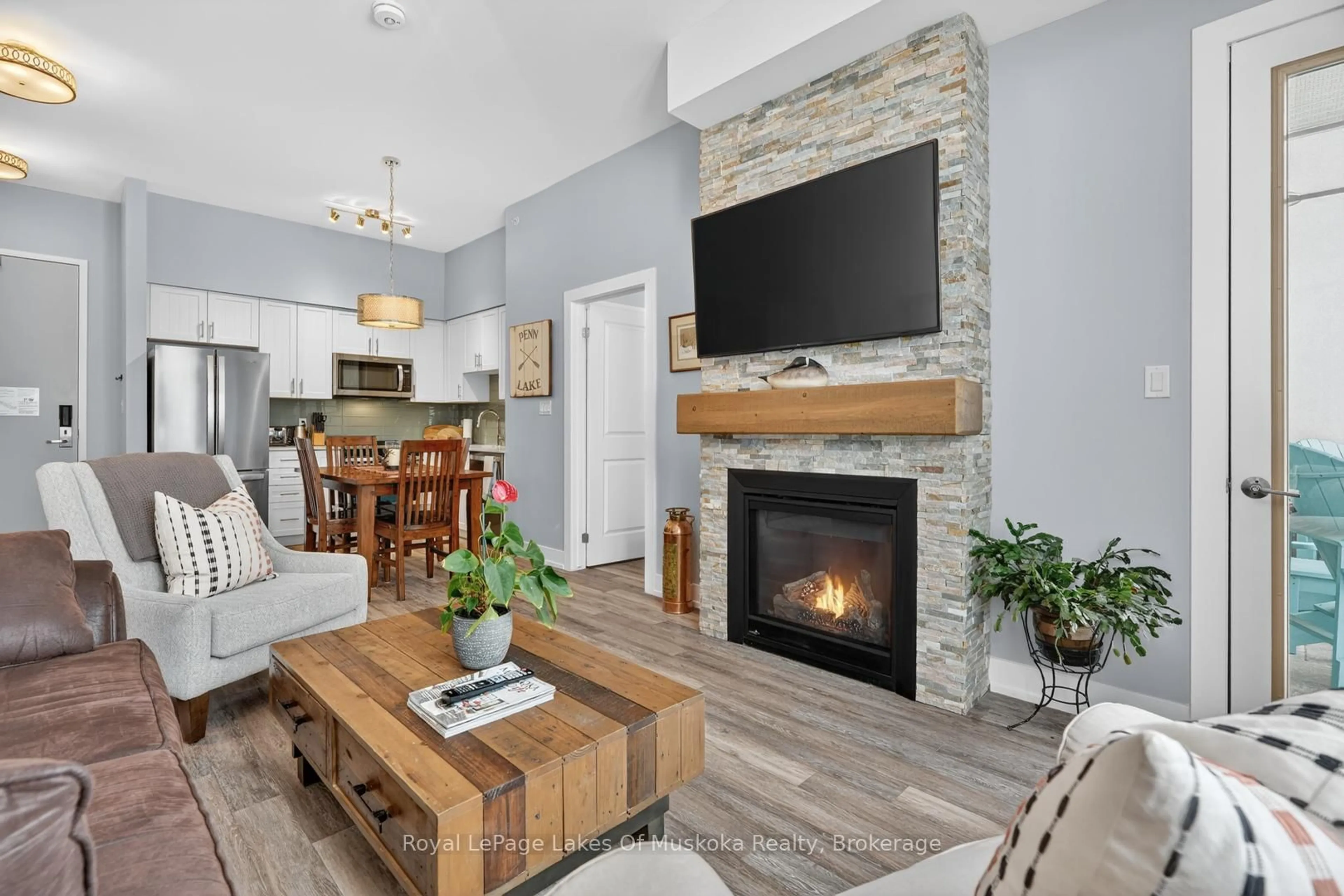 Living room with furniture, unknown for 25 Pen Lake Point Rd #102, Huntsville Ontario P1H 1A9