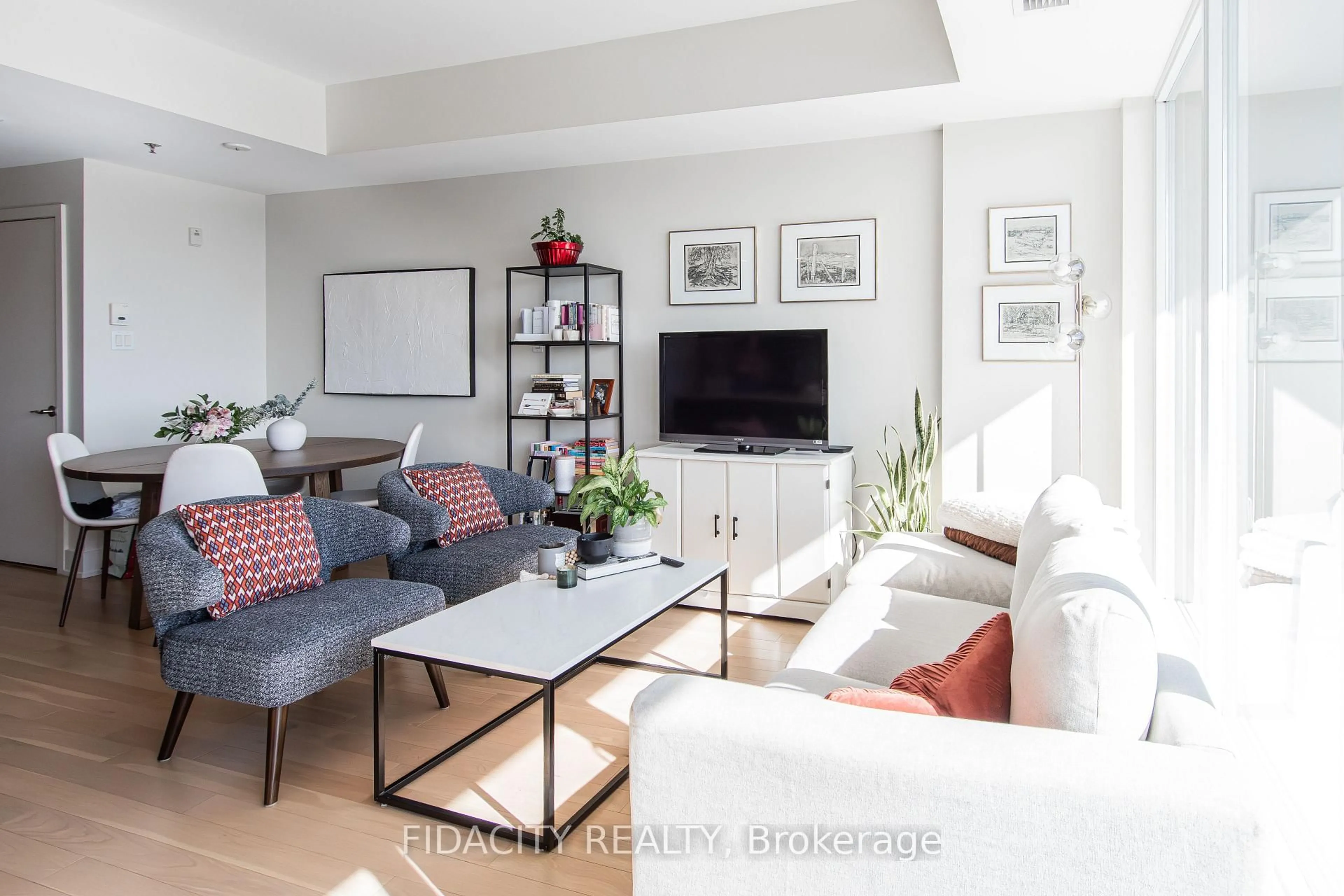 Living room with furniture, unknown for 98 Richmond Rd #802, Ottawa Ontario K1Z 0B2