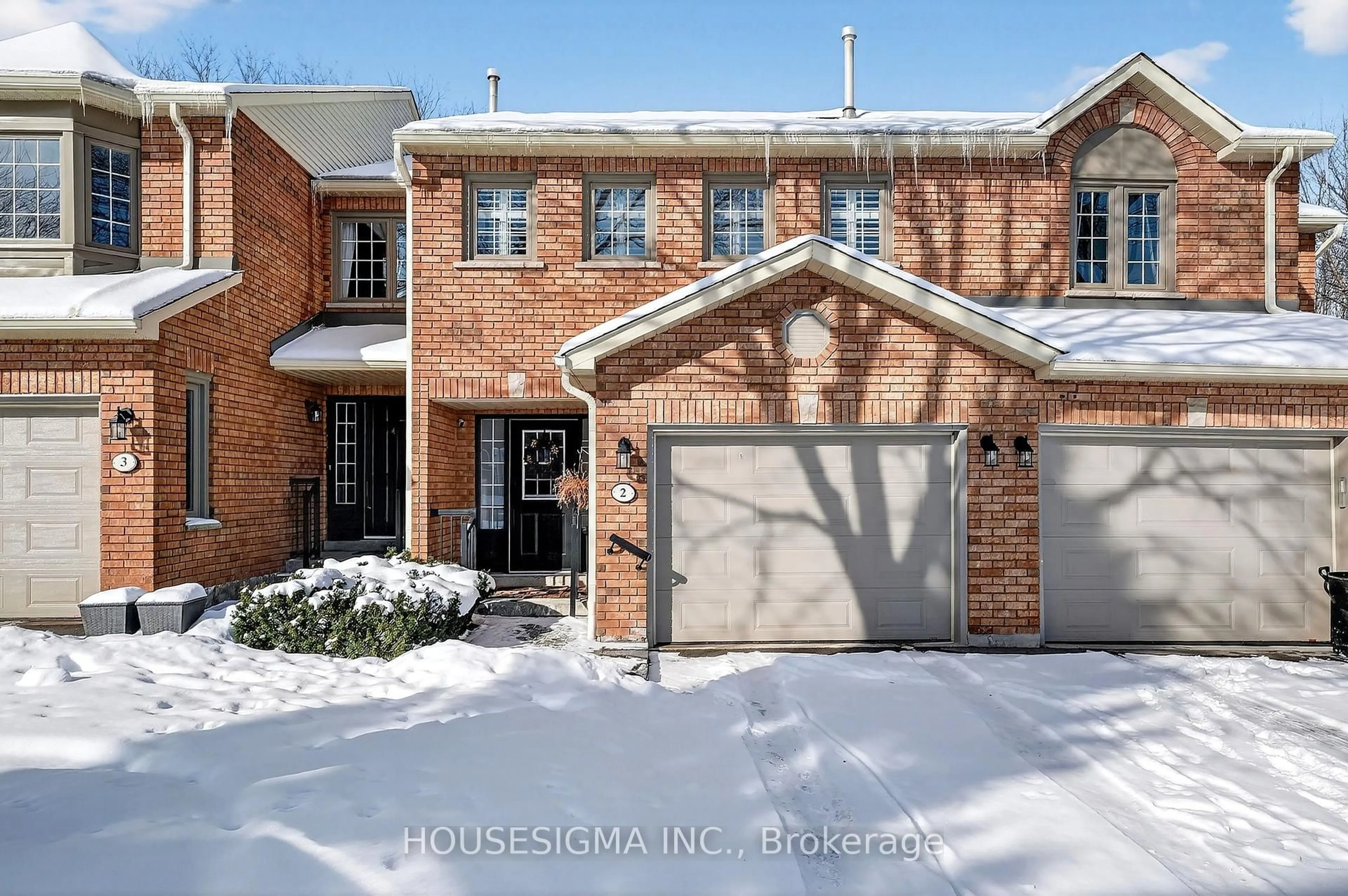 Home with brick exterior material, street for 14 Huntingwood Ave #2, Hamilton Ontario L9H 6X3